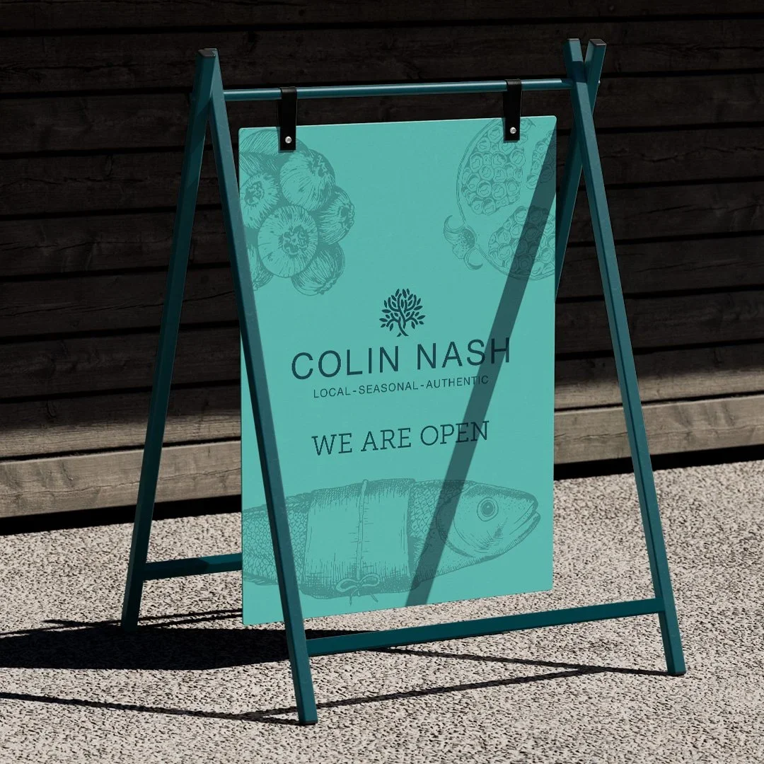 colin nash a board sign designed by saia creative