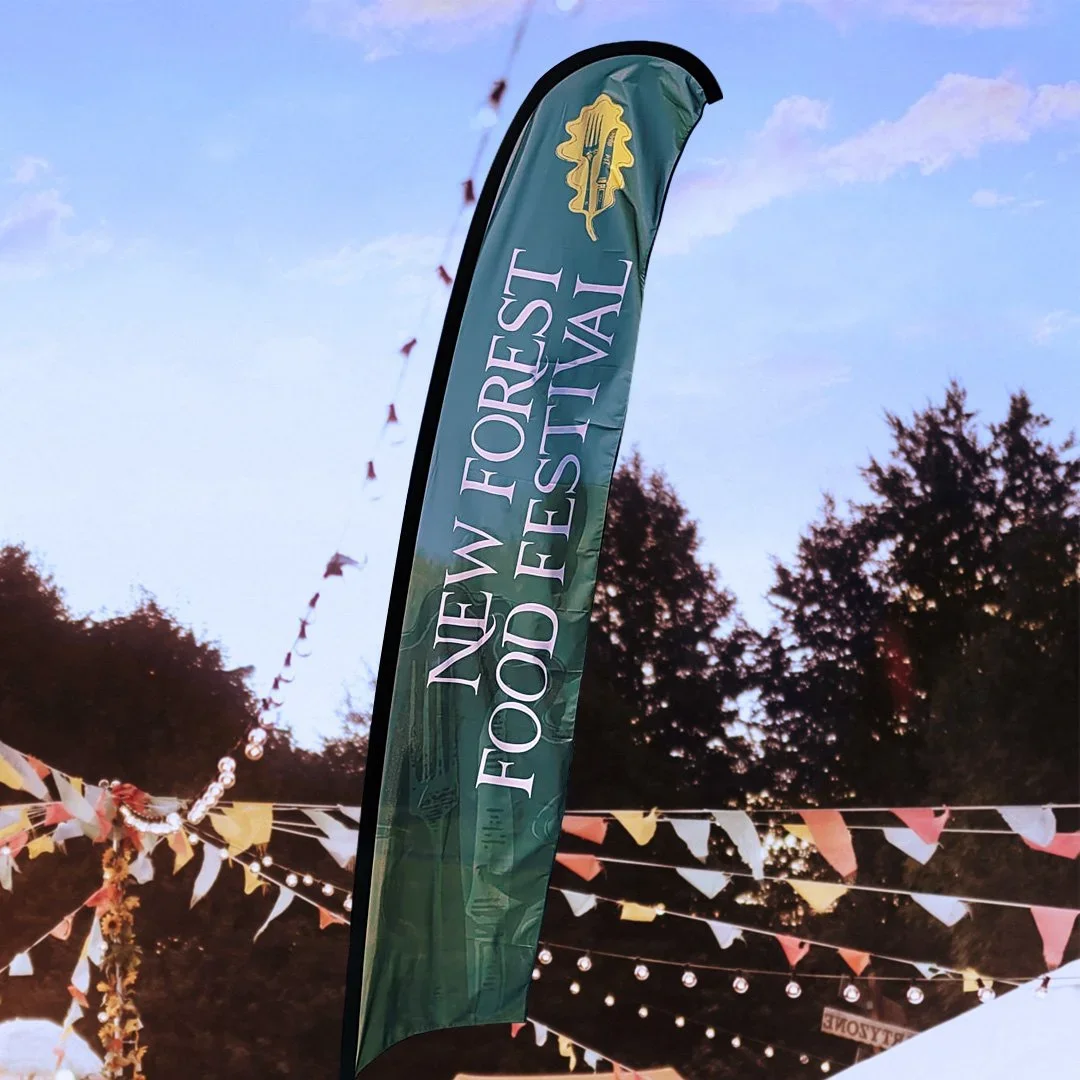 new forest food festival logo feather flag designed by saia creative