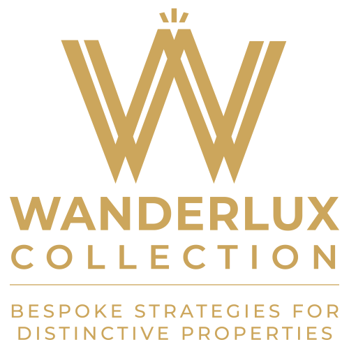 WanderluxLogoGoldWithTaglineFinal transparent.png