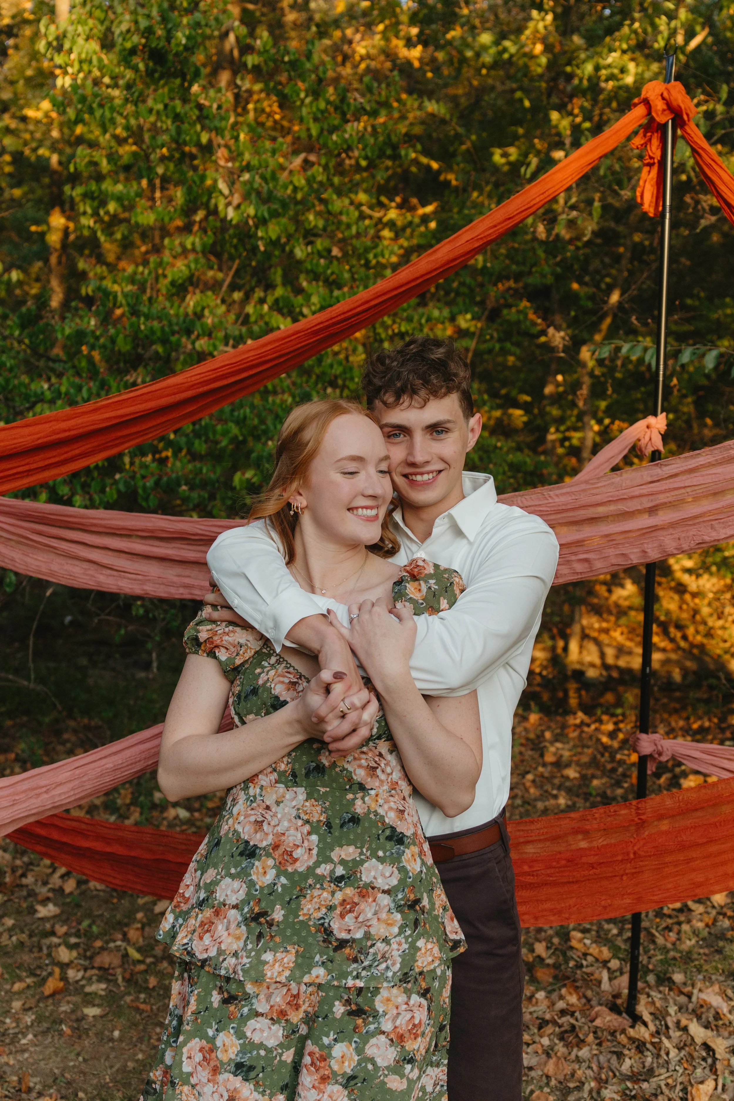 Timeless engagement proposal photos in downtown Fayetteville, AR Rayli Rose Photography 