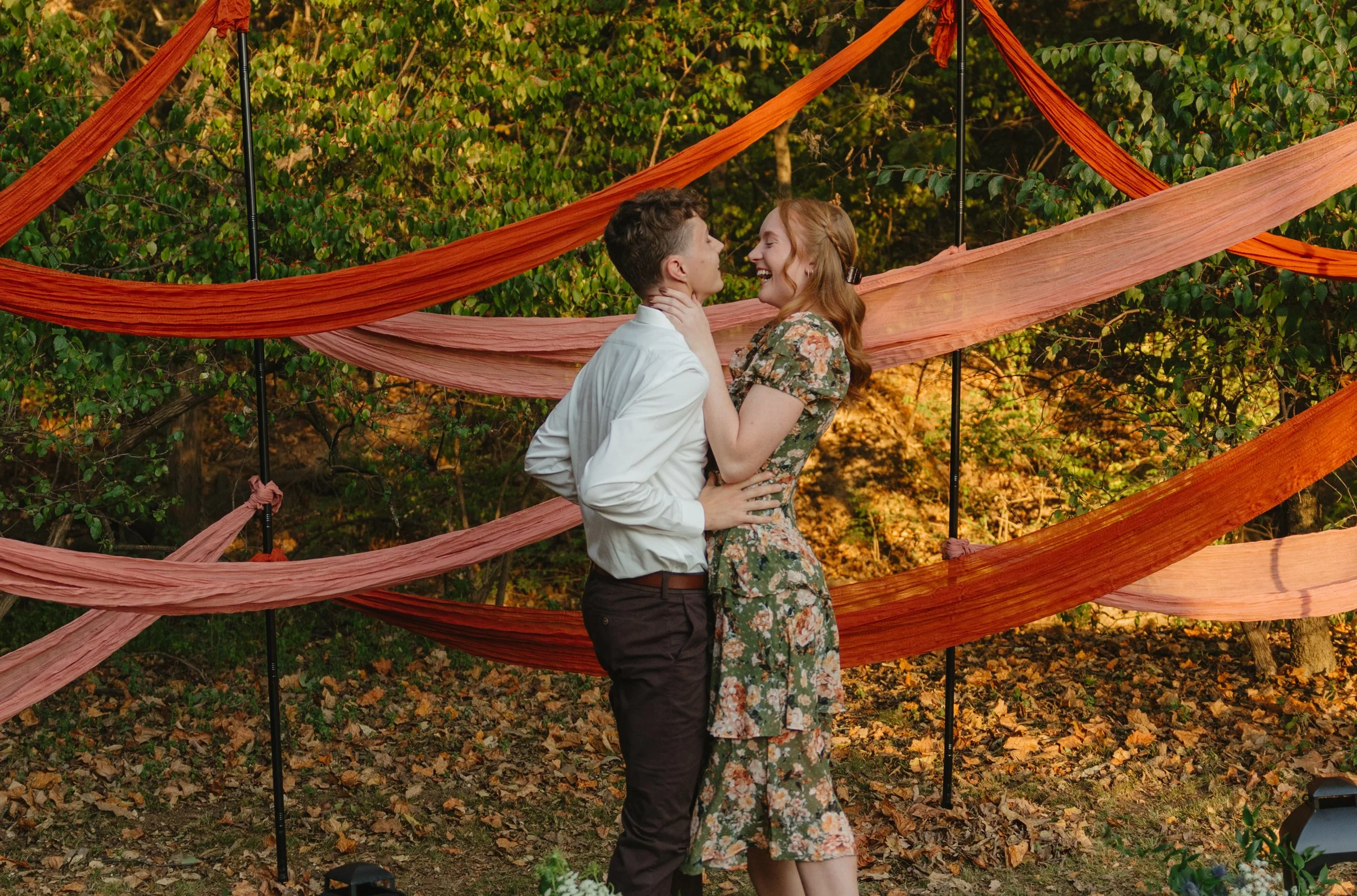 Timeless engagement proposal photos in downtown Fayetteville, AR Rayli Rose Photography 