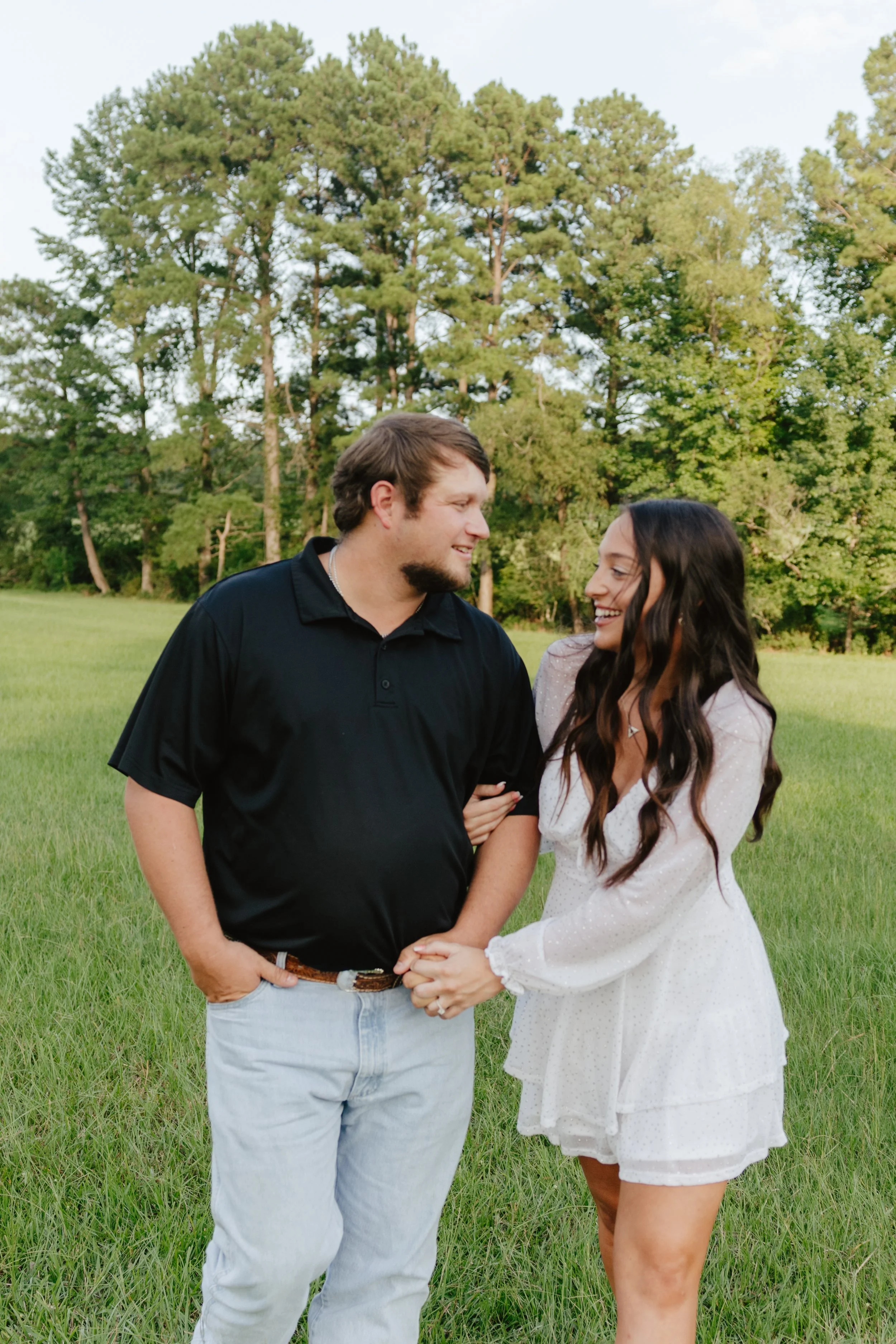 Timeless engagement proposal photos in the mountains in Bentonville, AR Rayli Rose Photography 