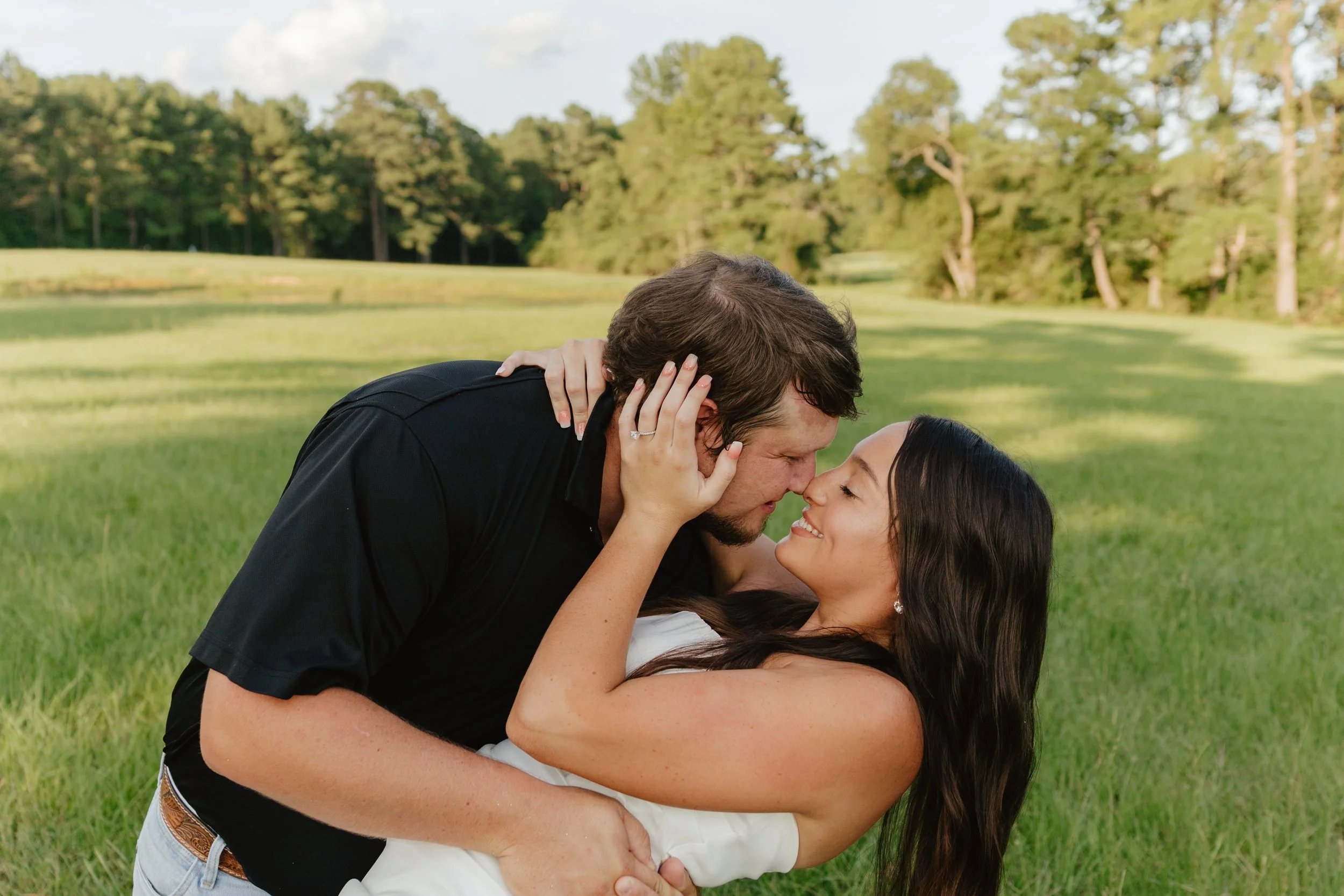 Timeless engagement proposal photos in the mountains in Bentonville, AR Rayli Rose Photography 