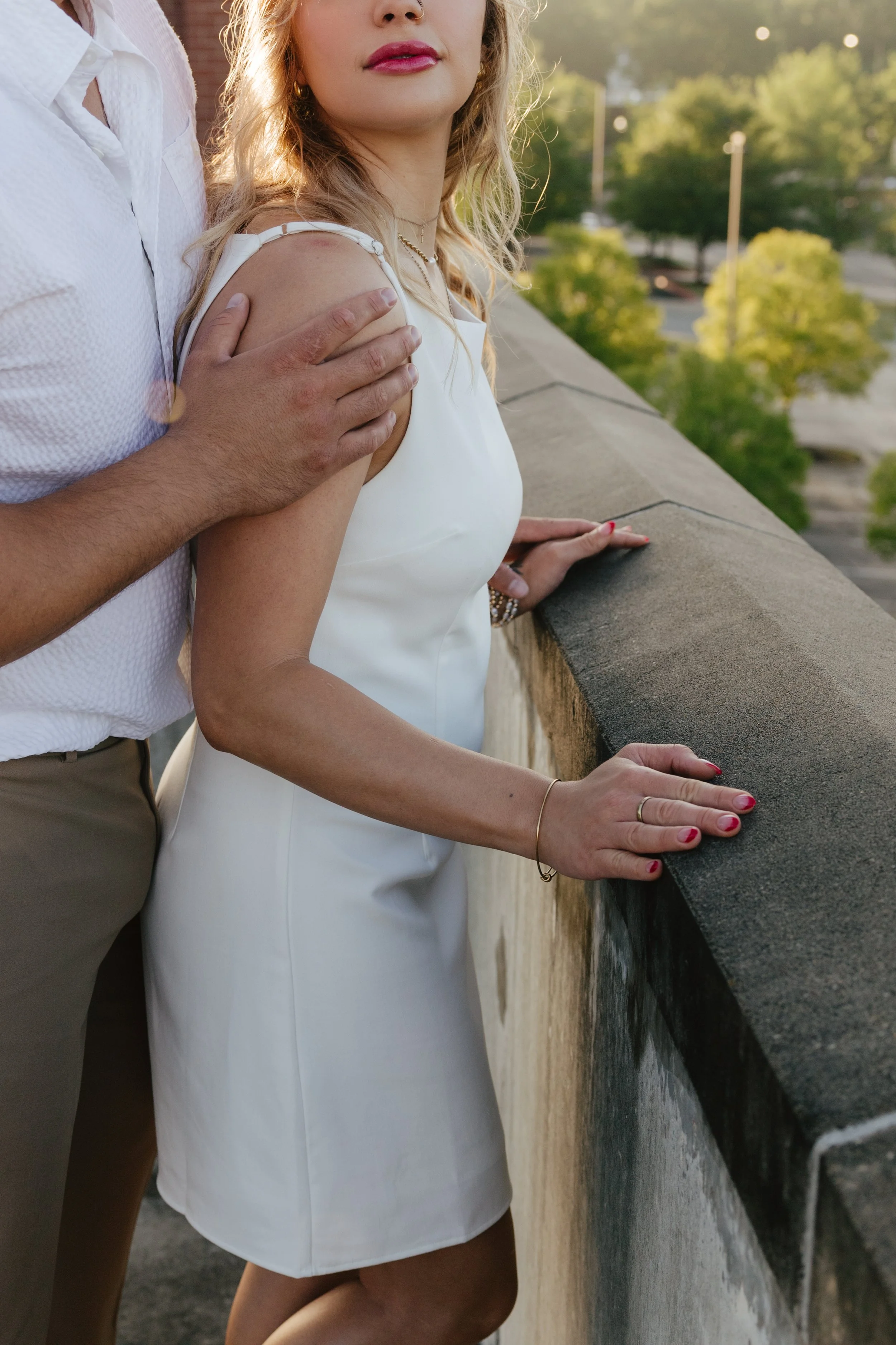 Timeless engagement proposal photos in downtown Fayetteville, AR Rayli Rose Photography 