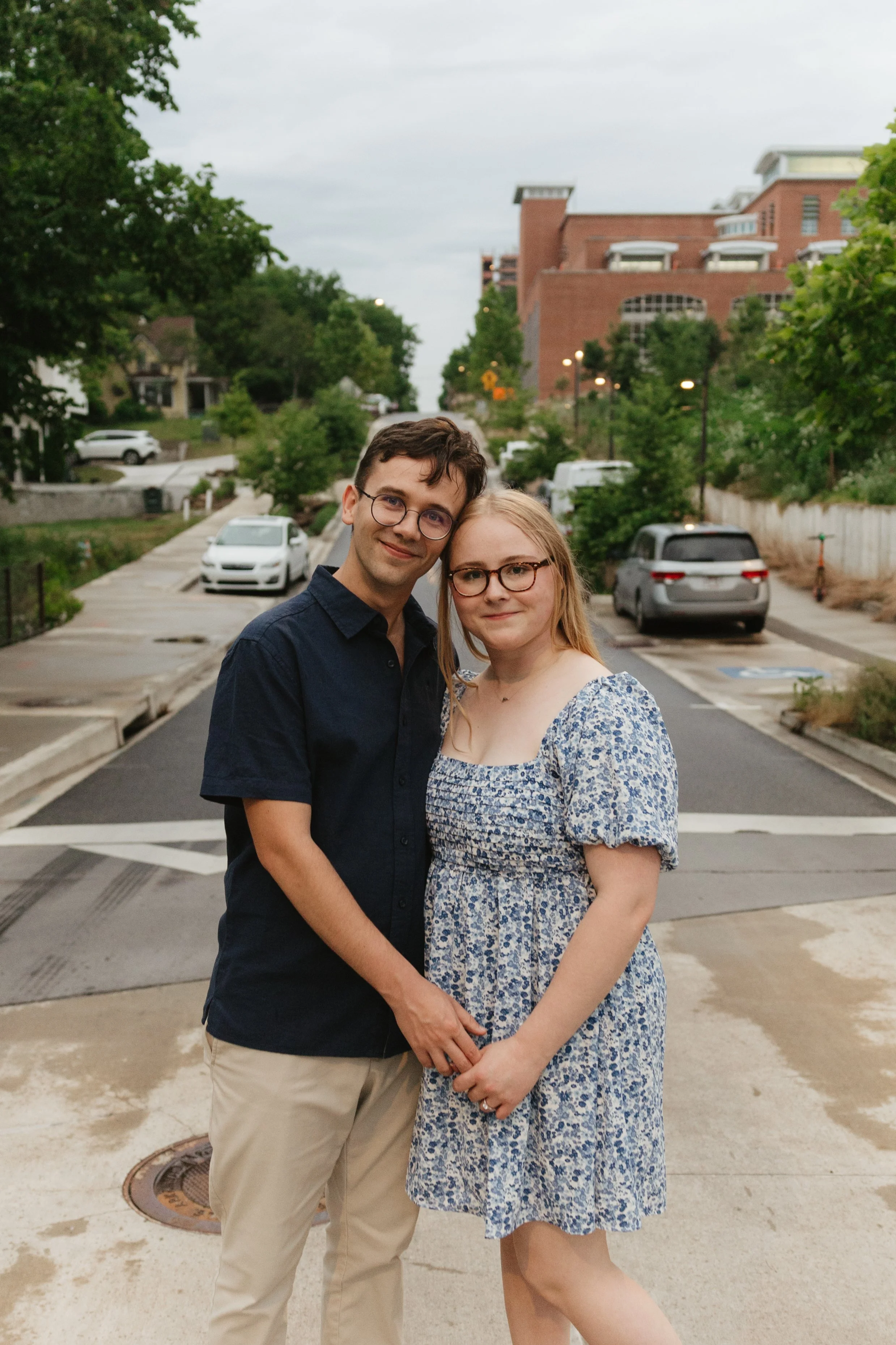 Timeless engagement proposal photos in downtown Fayetteville, AR Rayli Rose Photography 