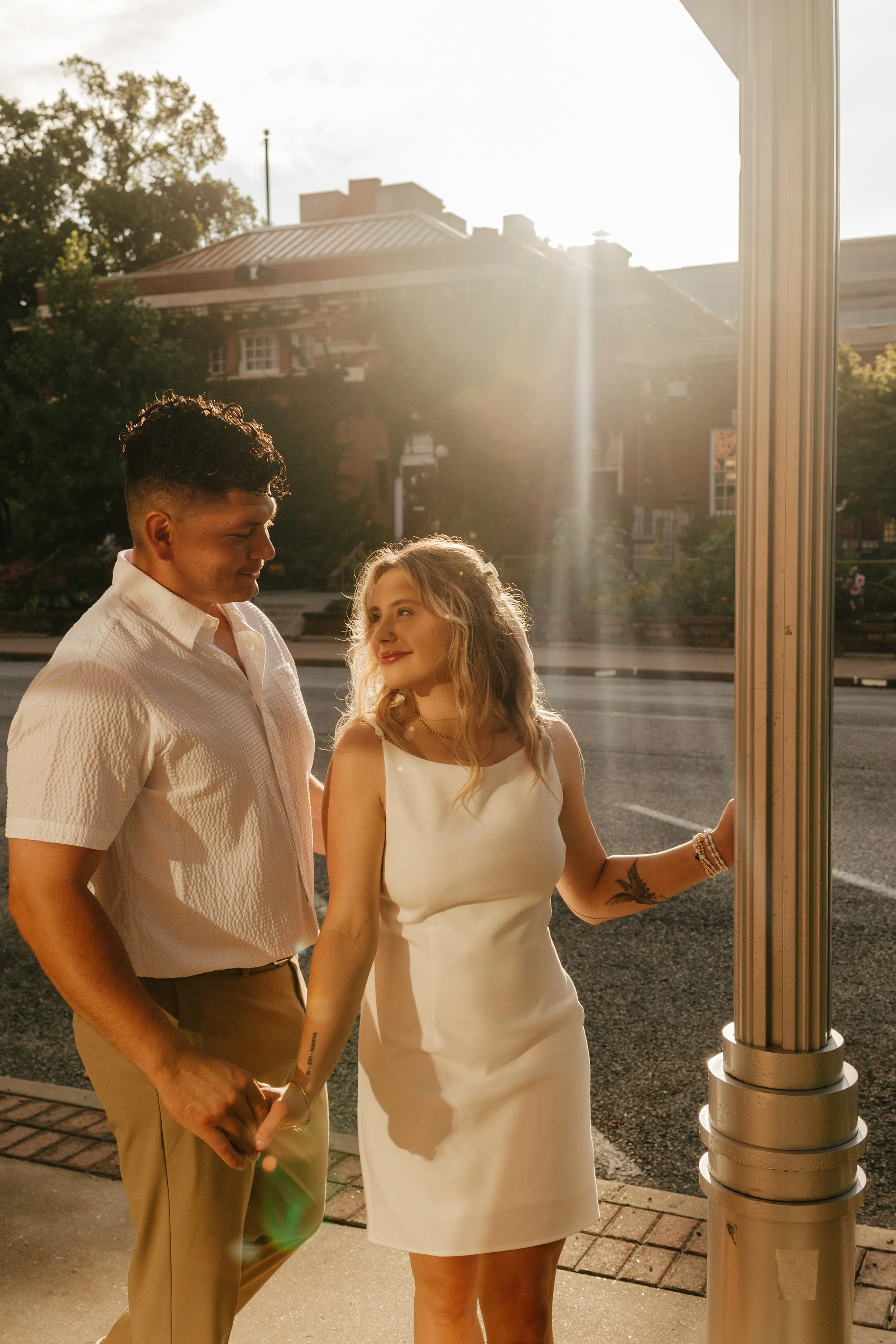 Timeless engagement proposal photos in downtown Fayetteville, AR Rayli Rose Photography 