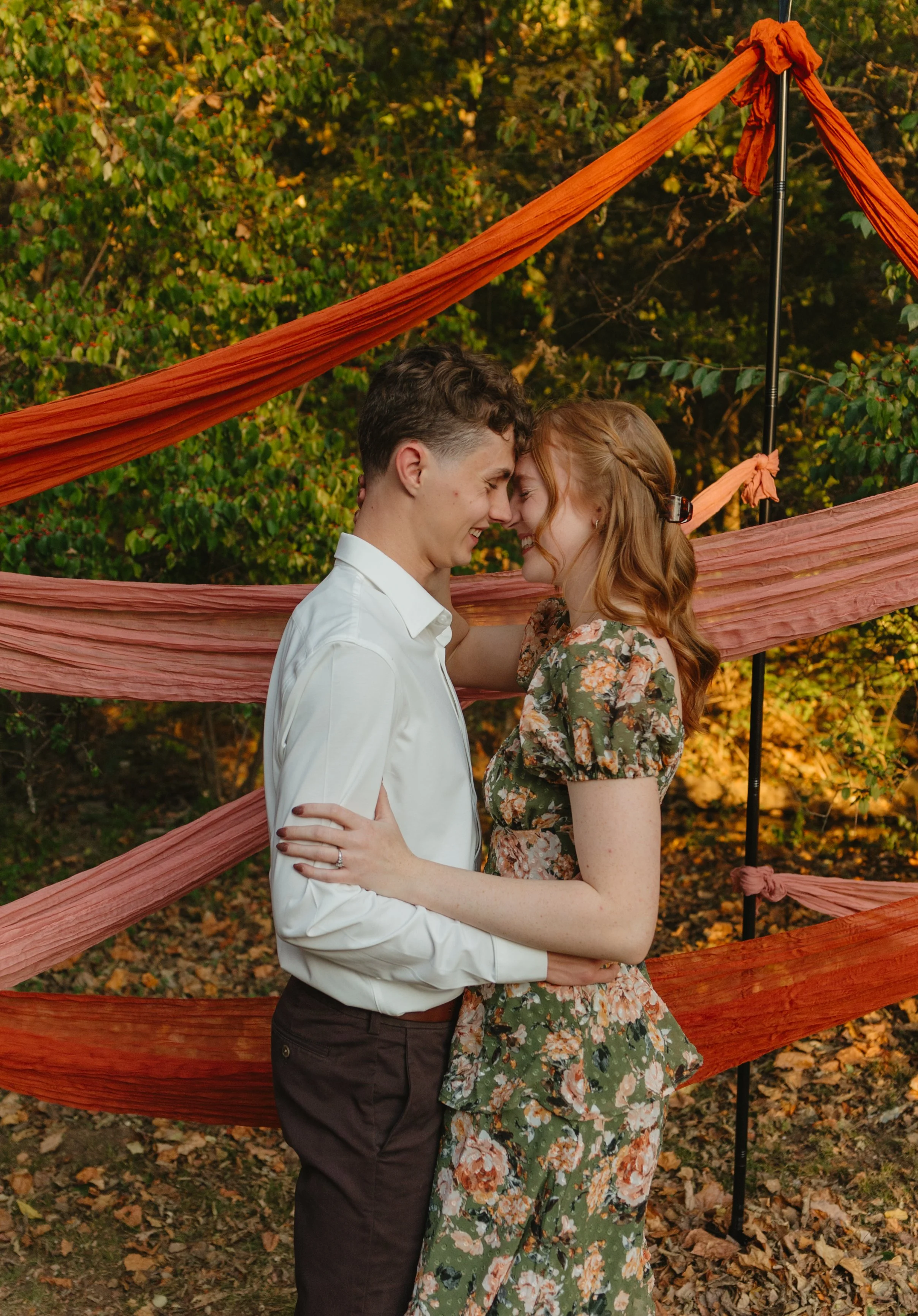 Timeless engagement proposal photos in downtown Fayetteville, AR Rayli Rose Photography 