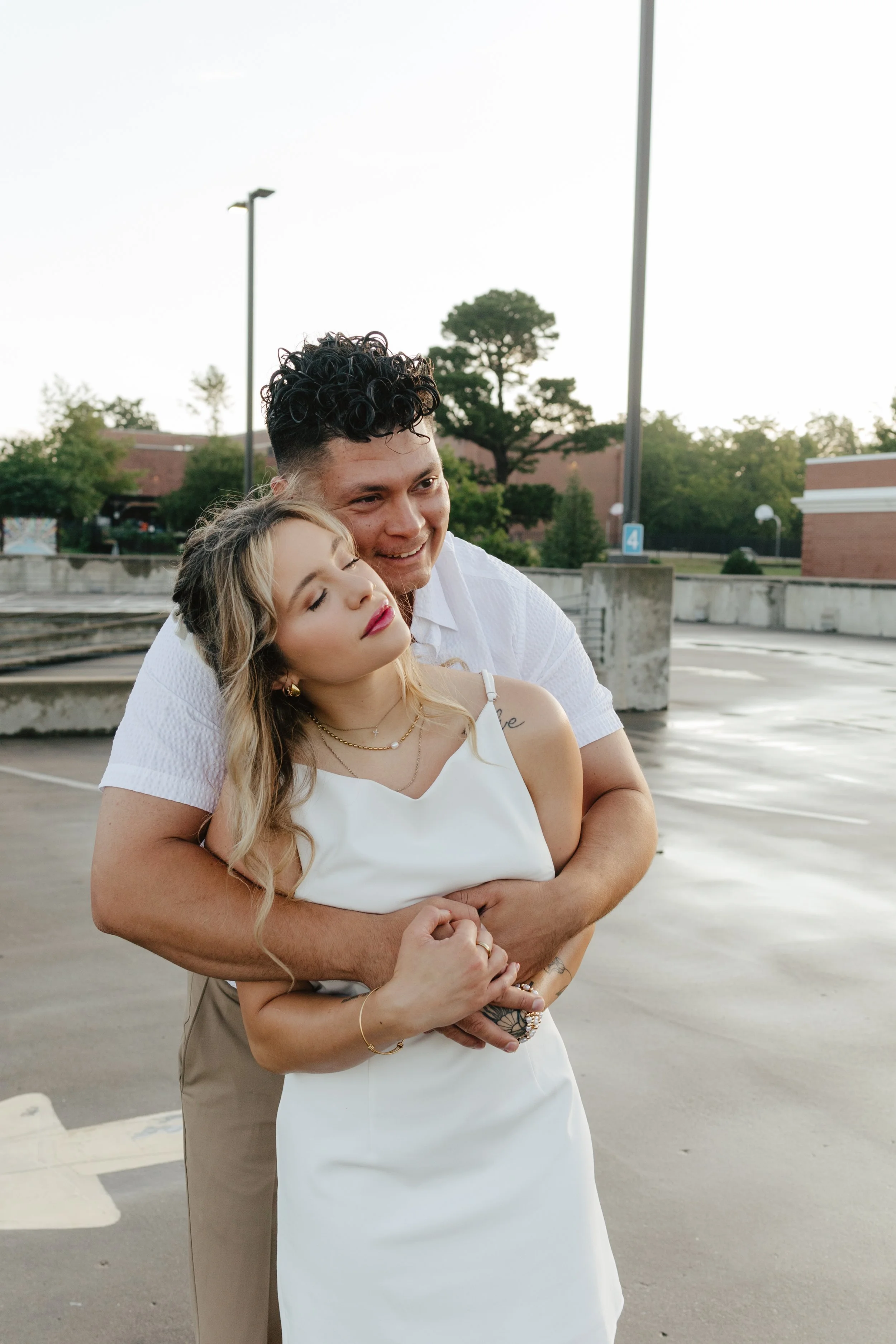 Timeless engagement proposal photos in downtown Fayetteville, AR Rayli Rose Photography 