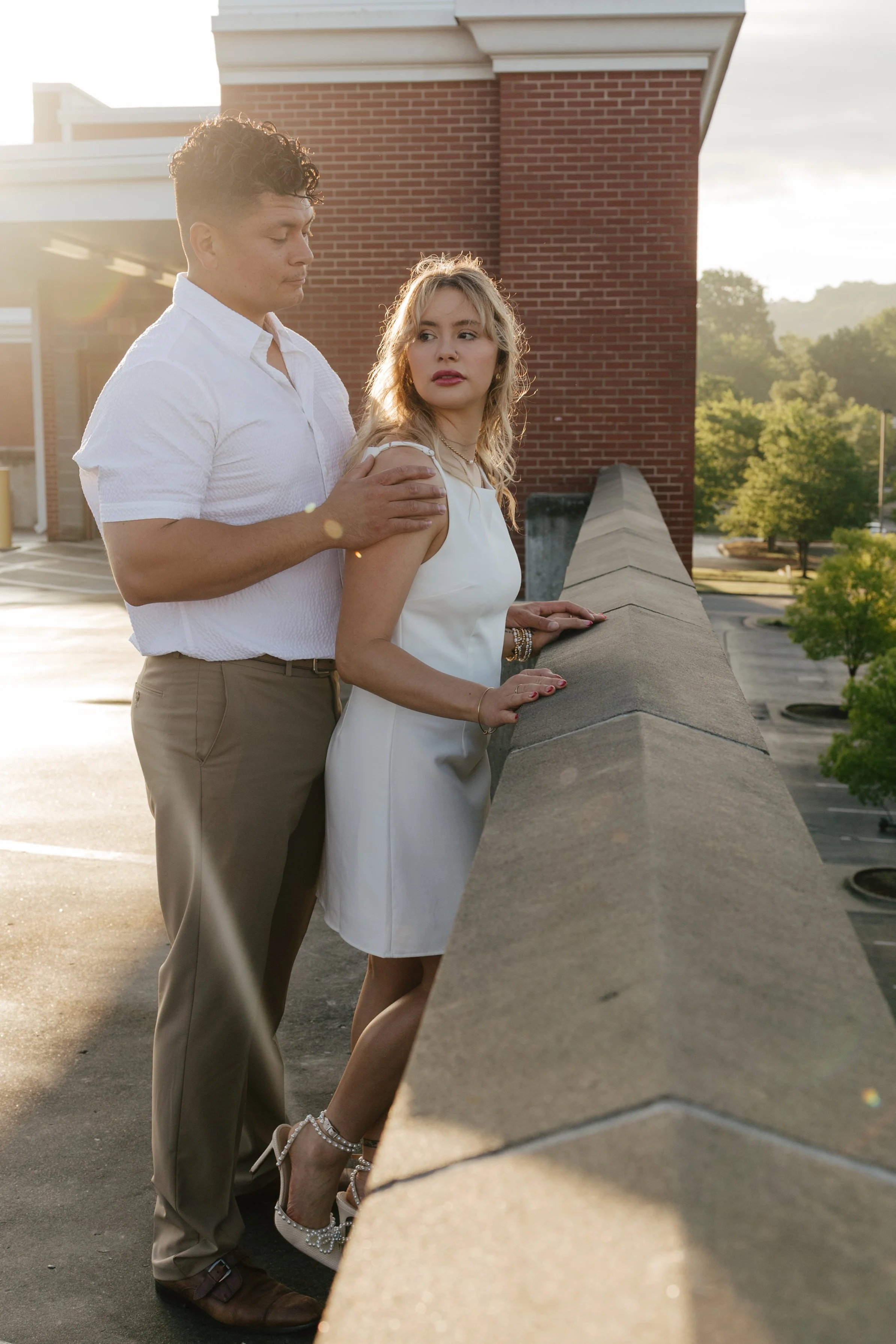 Timeless engagement proposal photos in downtown Fayetteville, AR Rayli Rose Photography 