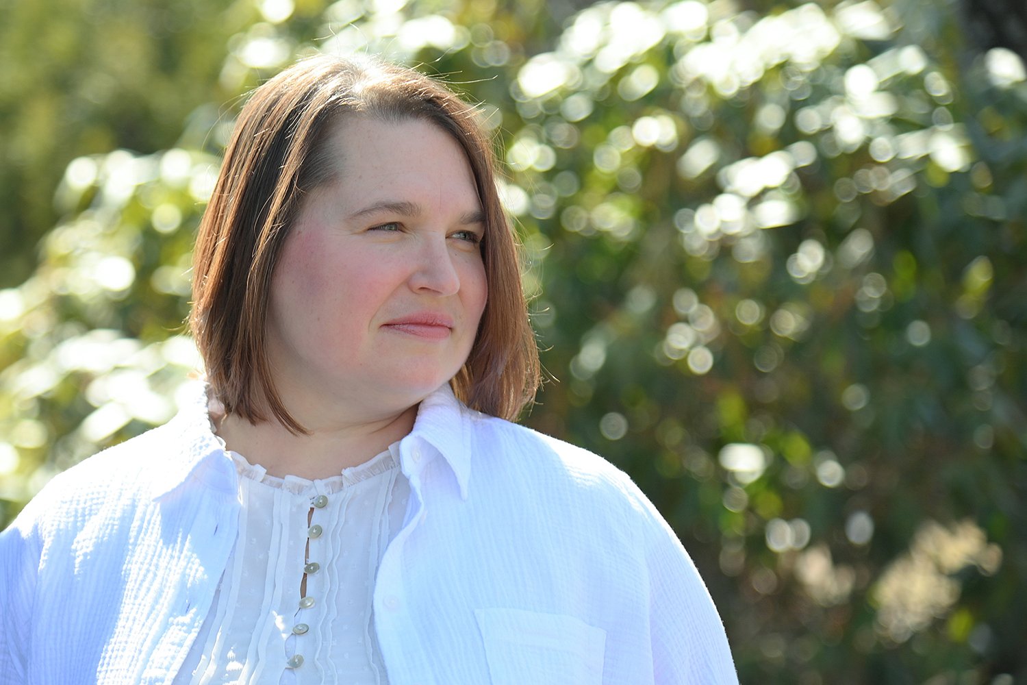 Alison Keller, end-of-life-doula based in the Pioneer Valley, looking off camera