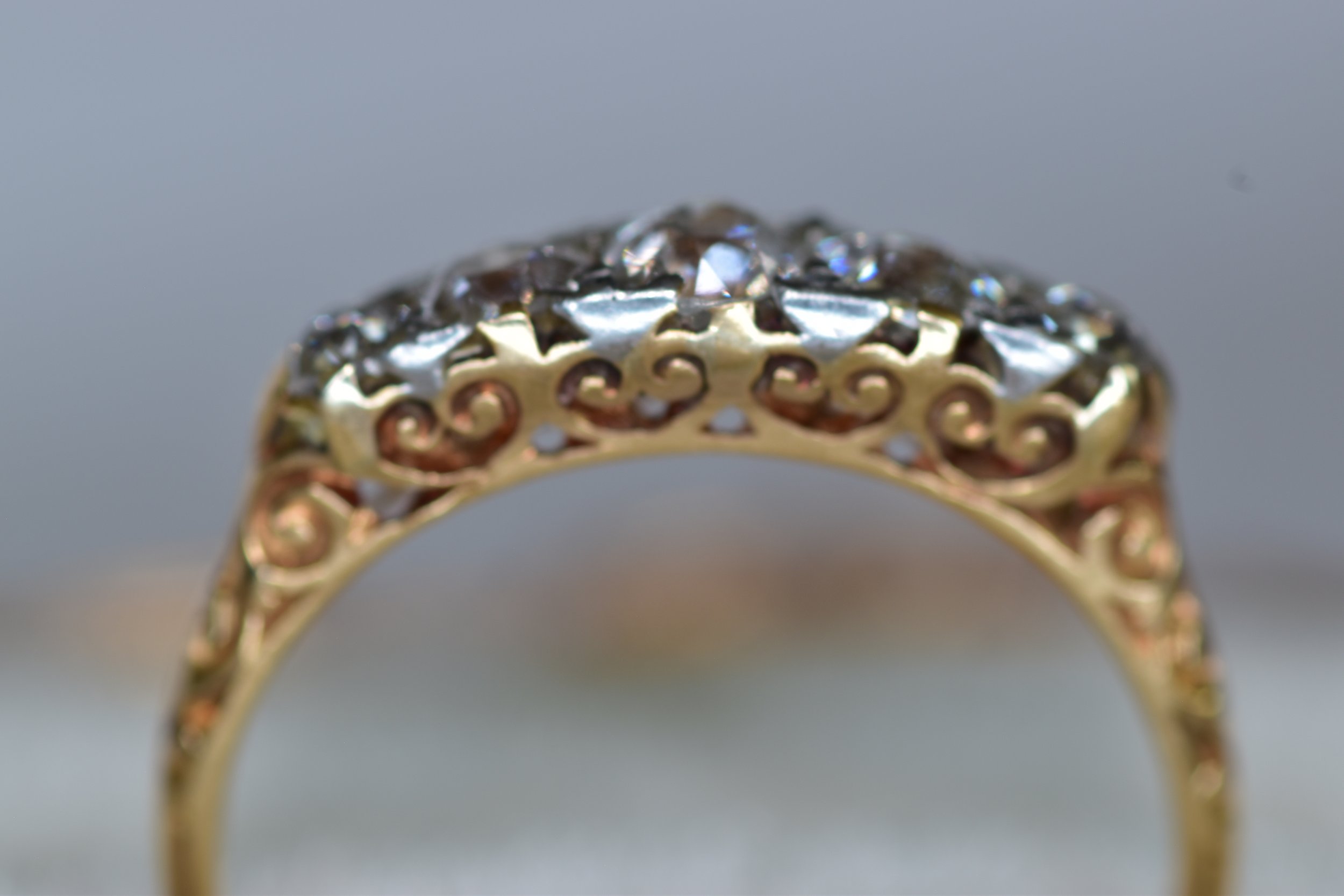 Antique Edwardian European-cut diamond band ring in gold and platinum