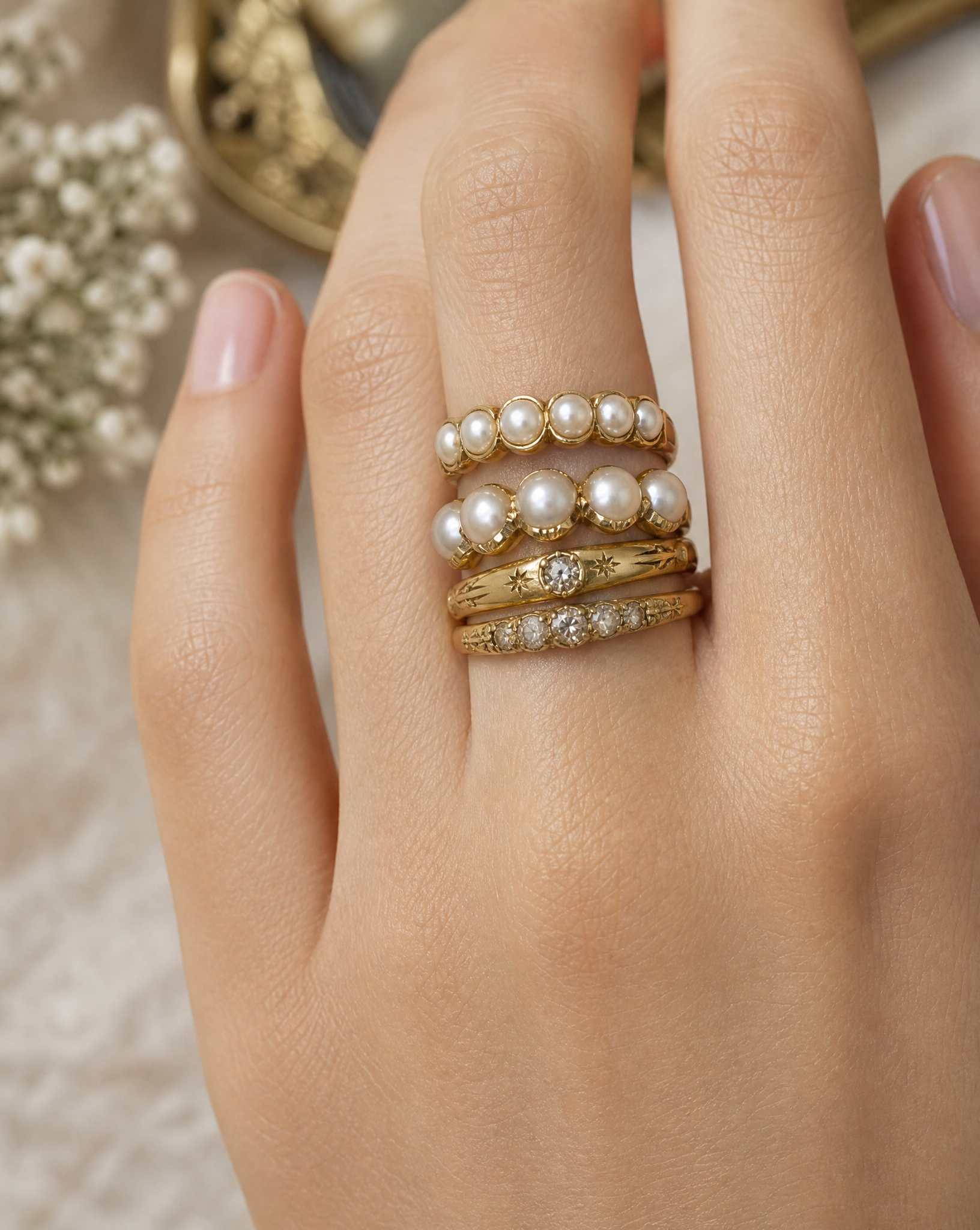antique split pearl stacking with gold engraved and other pearl ring
