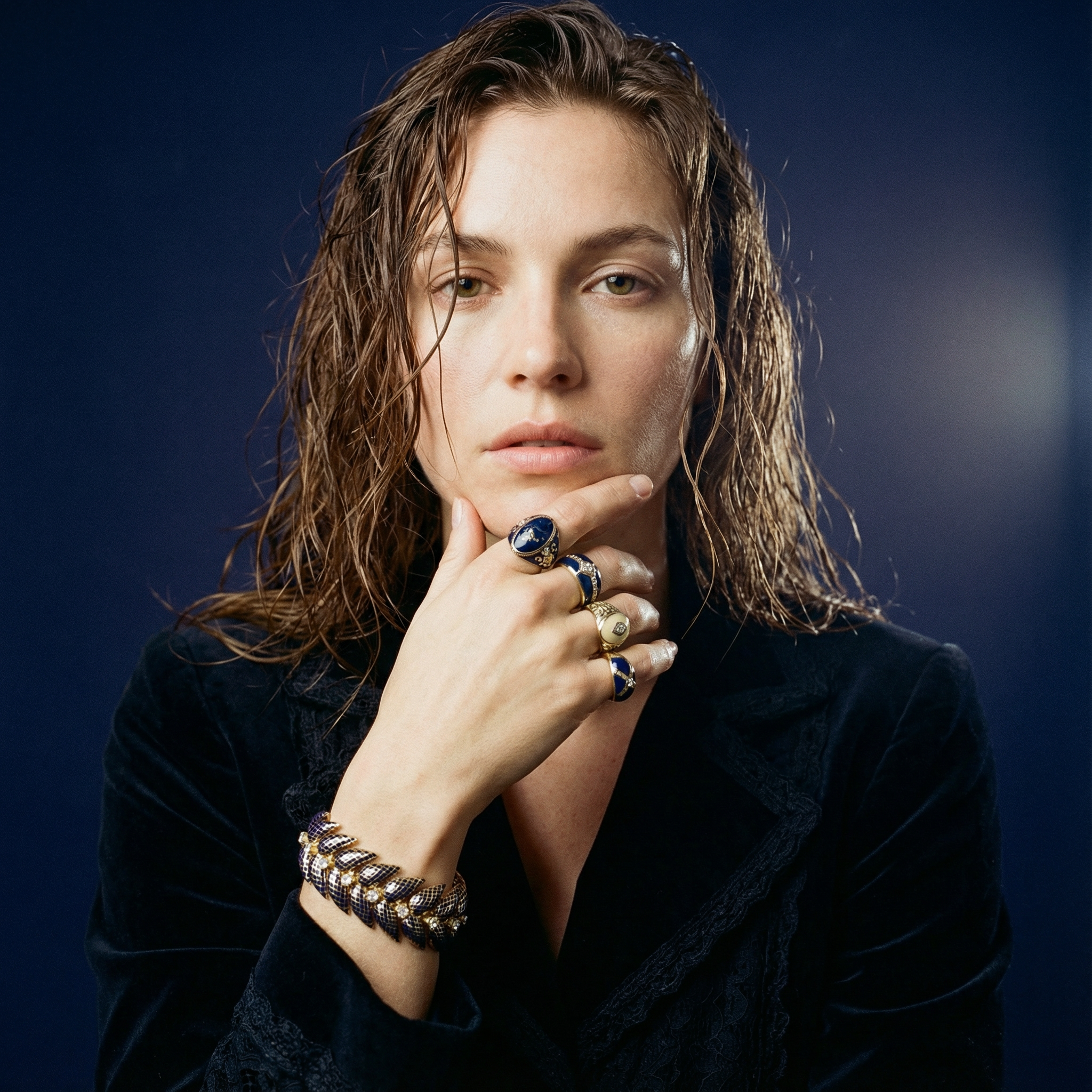 Ornate gold bracelet on models wrist with enamel rings victorian retro ultrarealistic (1).png