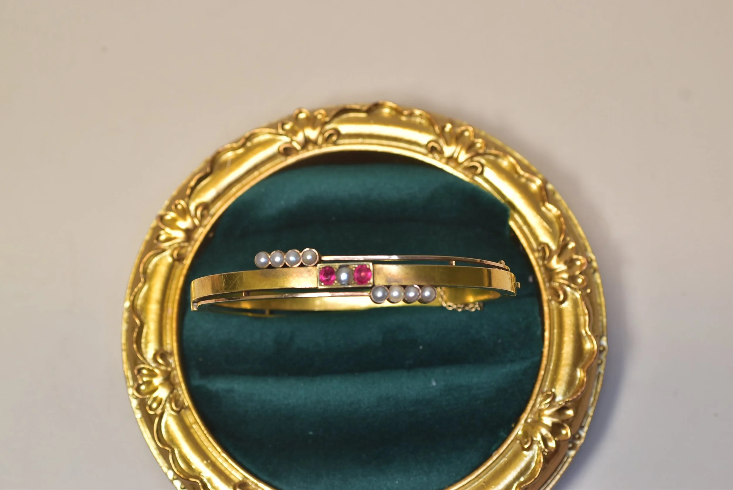 Antique Russian Solid 20 karat gold Pearl Ruby Bangle Bracelet On Green Velvet Display