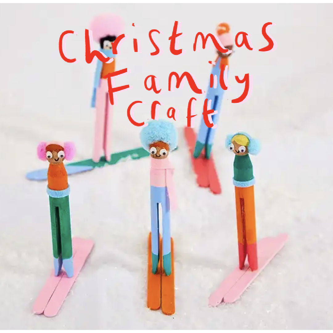 Colorful Christmas family craft made with painted small sticks, pom-poms, googly eyes, and paper. The craft spells out 'Christmas Family Craft' written in red marker on the image.