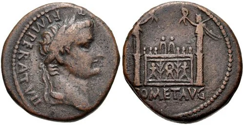 A silver Roman denarius featuring Emperor Tiberius. On the obverse, a right-facing, laureate portrait of Tiberius is inscribed with TI CAESAR AVGVST F IMPERAT VII (Tiberius Caesar, son of Augustus, Emperor for the seventh time.).
