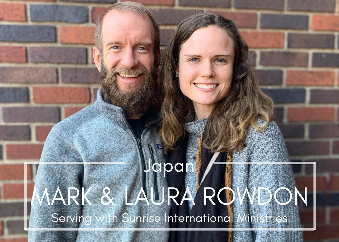 Smiling man and woman standing in front of a brick wall, labeled "Japan, Mark & Laura Rowdon, Serving with Sunrise International Ministries."