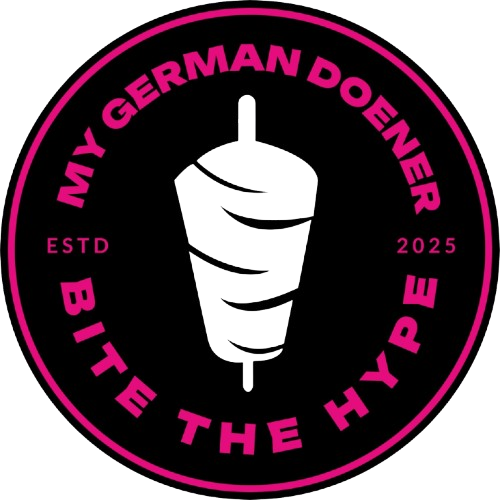 Logo with a black background and pink text that says 'My German Doener' at the top and 'Bite the hype' at the bottom. In the center, there is an illustration of a wrapped German döner kebab with a stick.