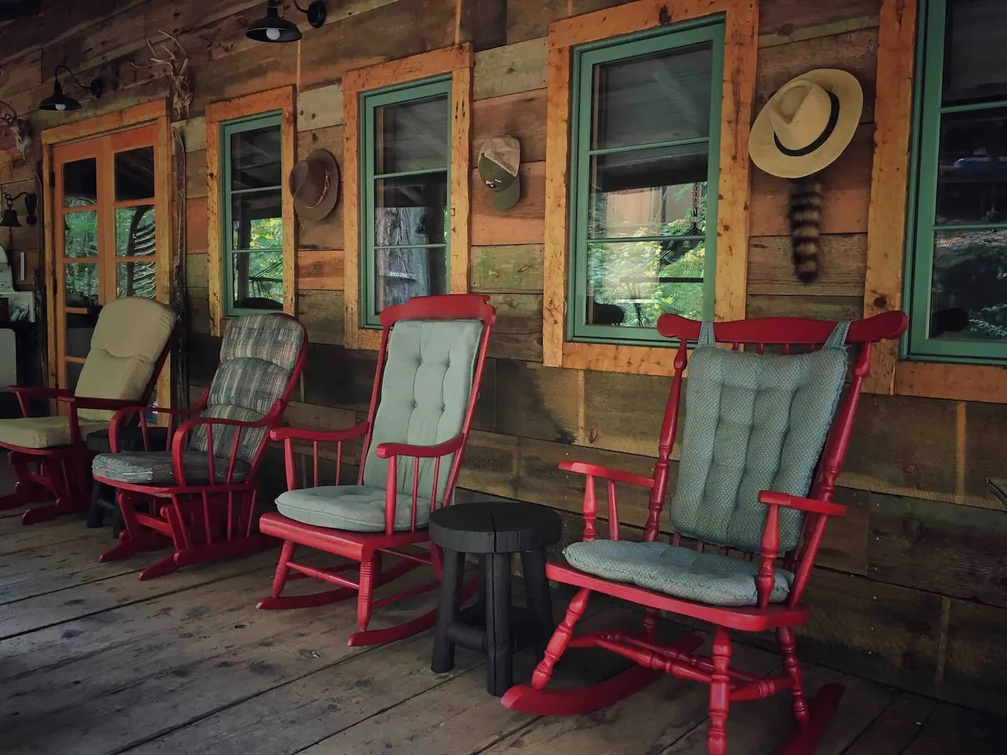 the old cabin porch with it's rocking chairs transports you to times past...relax...listen to nature's sounds...