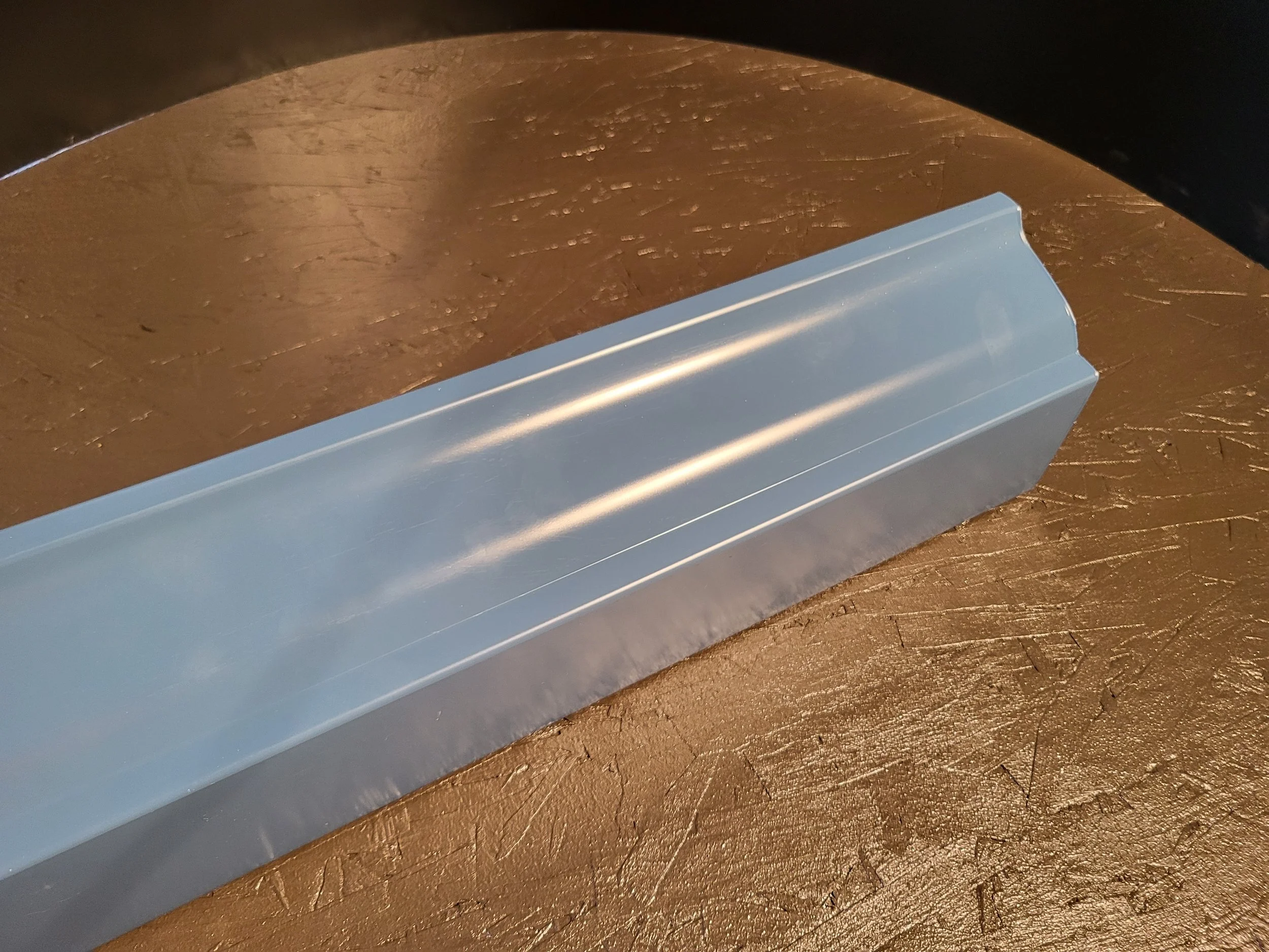 Close-up of a 5k blue gutter