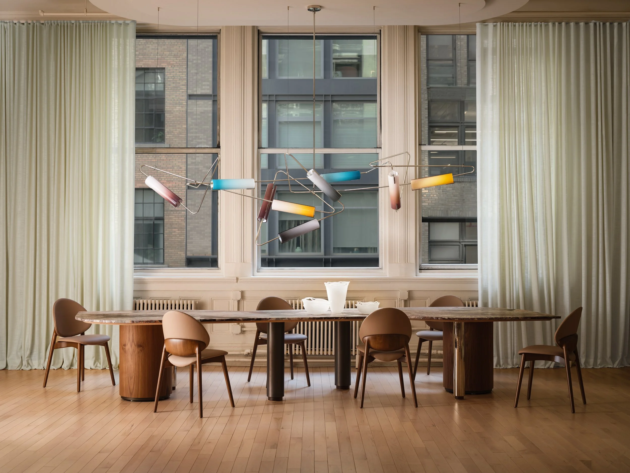  Continuum Custom Chandelier & Custom Table  
Site-specific projects offer personalized, unique functional artworks