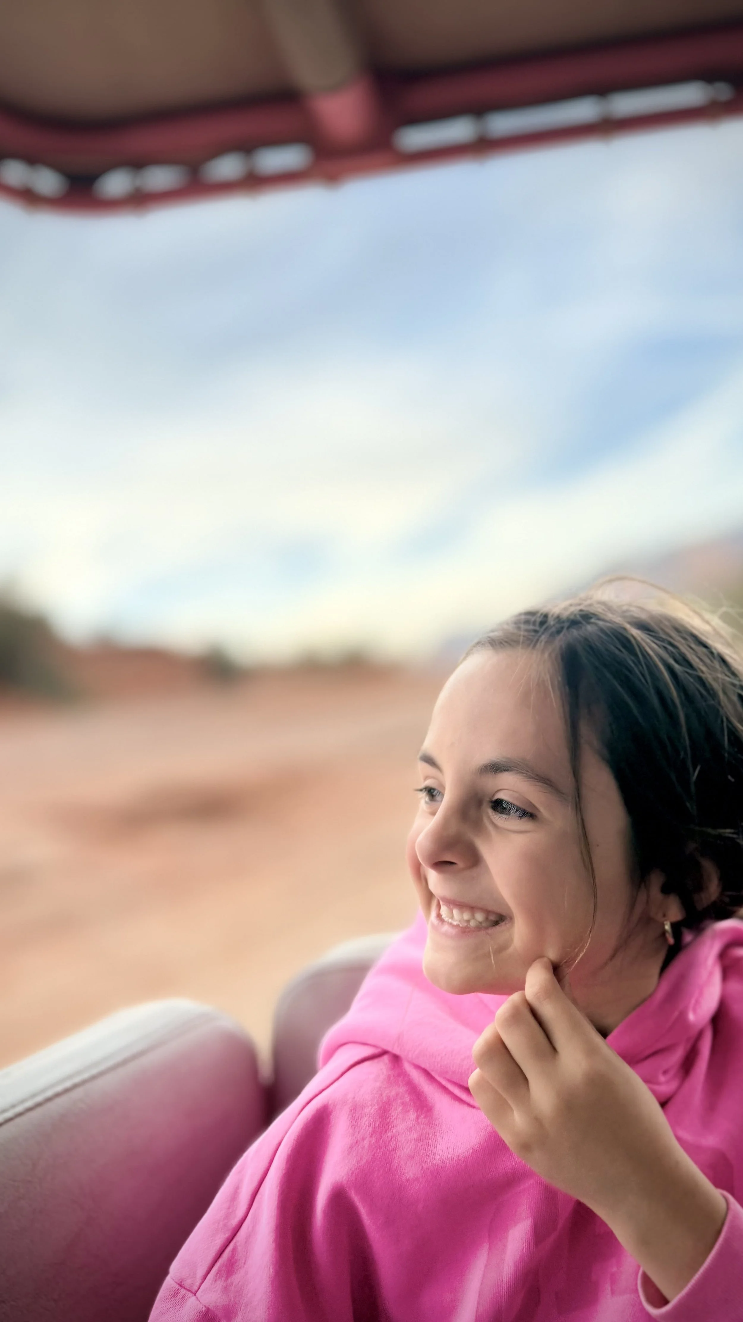 Luna on the Pink Jeep