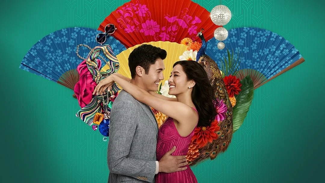 the characters from Crazy Rich Asians film posing together with background of fans and other items