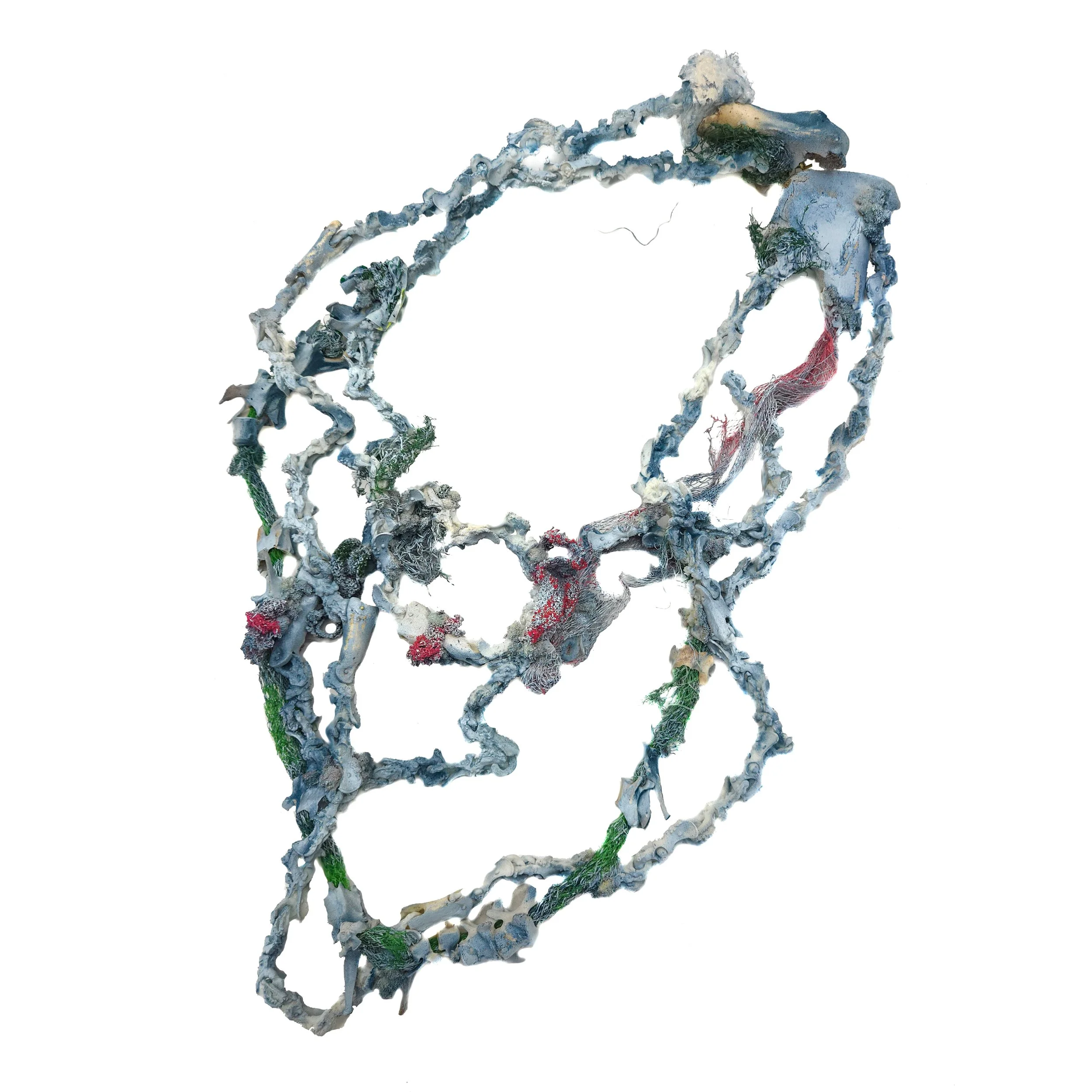 Specimen XVIII / 2025 / Bone, Biodegradable PLA, Found Plastic, Found Carpet Foam, Found Cord, Acrylic Spray Paint, Brass / 22x13x2