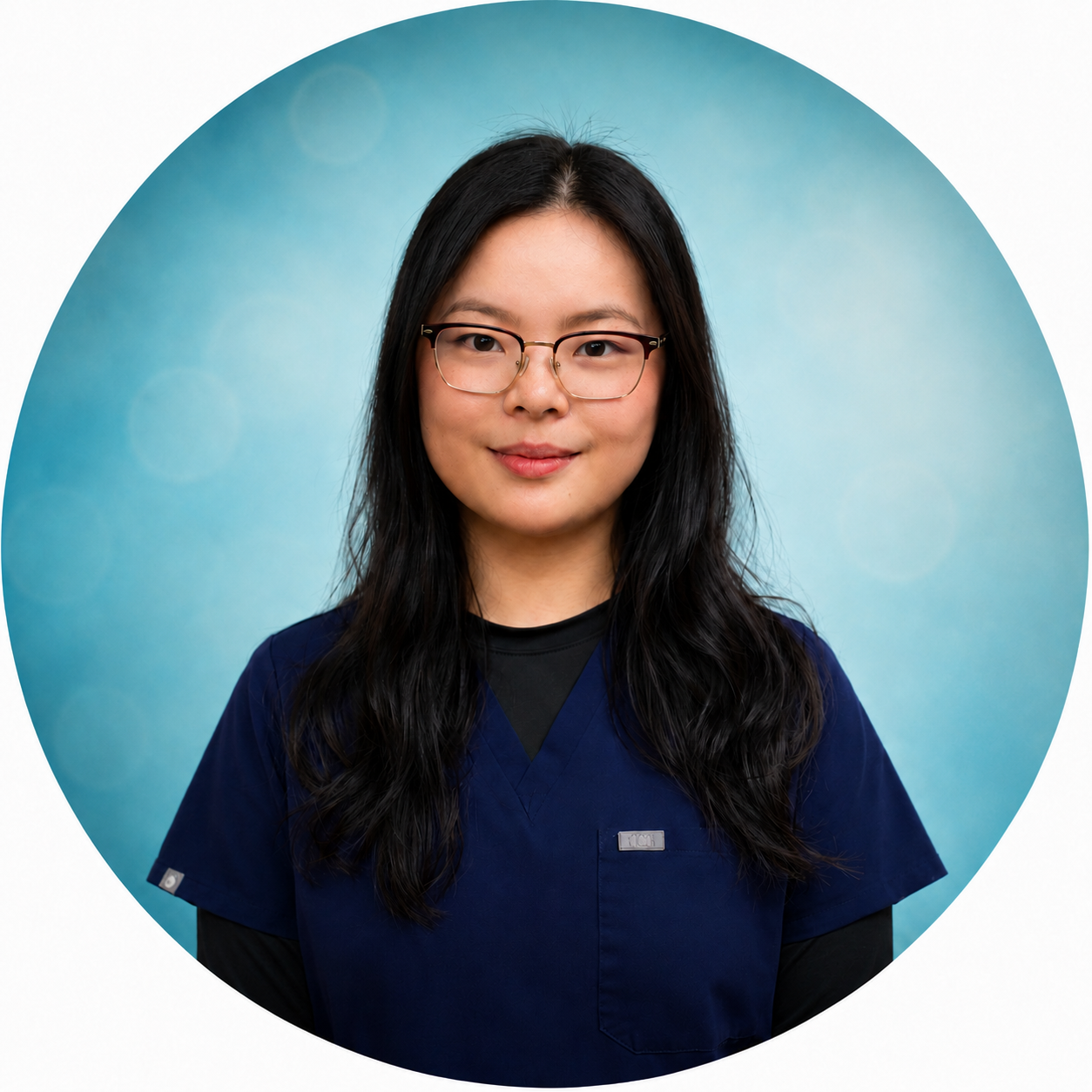 Young medical assistant standing in an office.