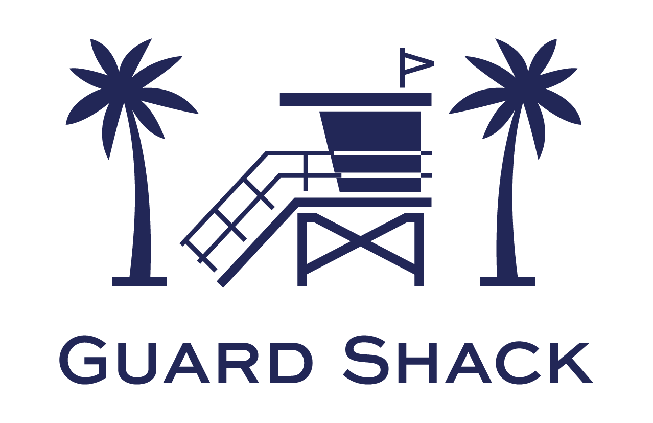 Logo featuring a lifeguard tower between two palm trees with the text 'Guard Shack' underneath.