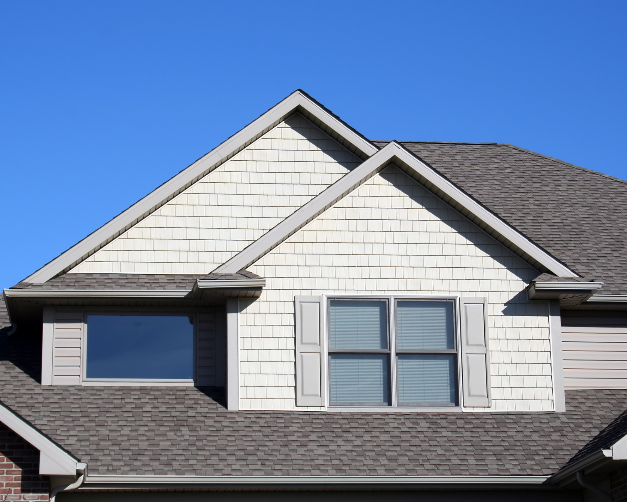 white house exterior with gray shutters