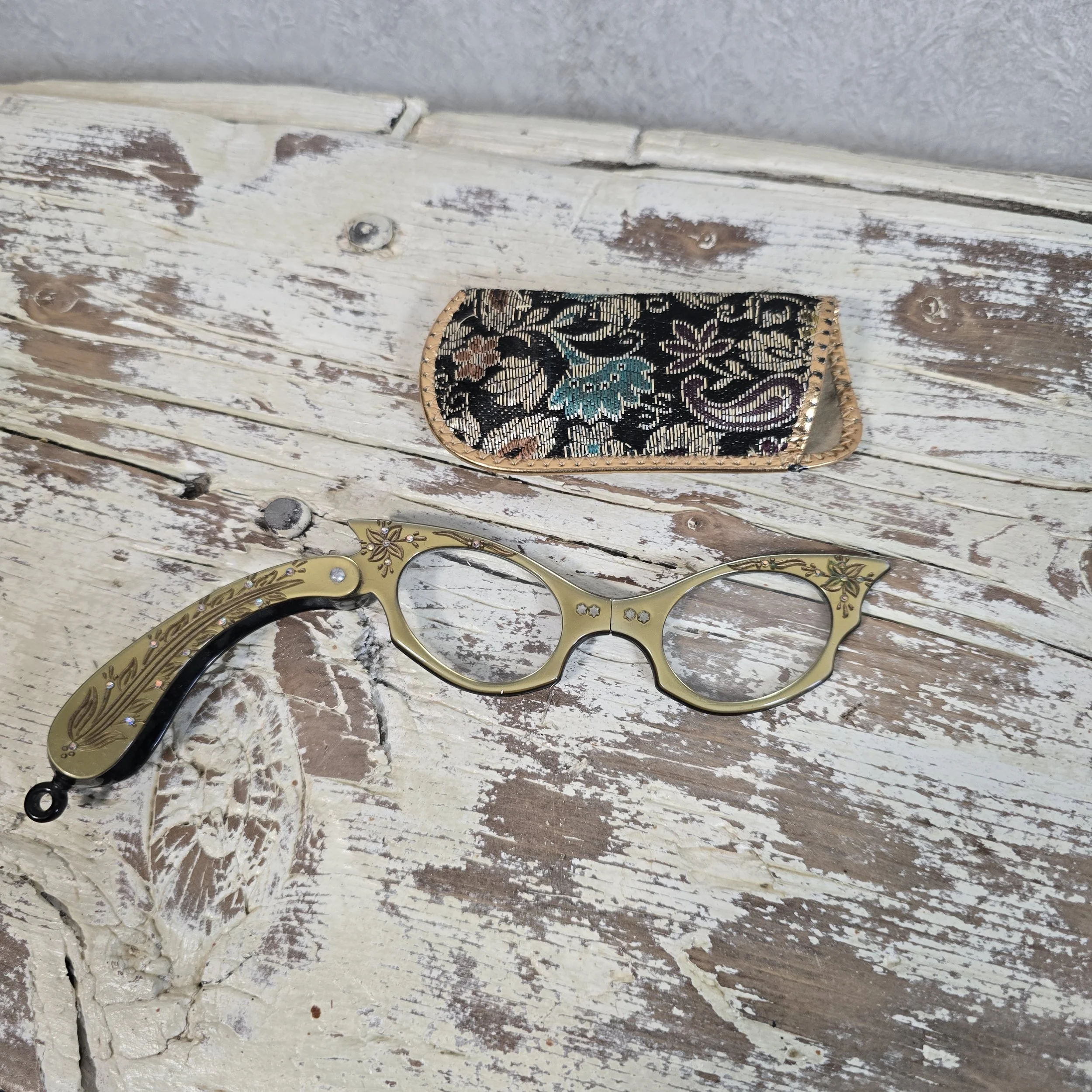 Vintage Lorgnette folding eye glasses.  $58