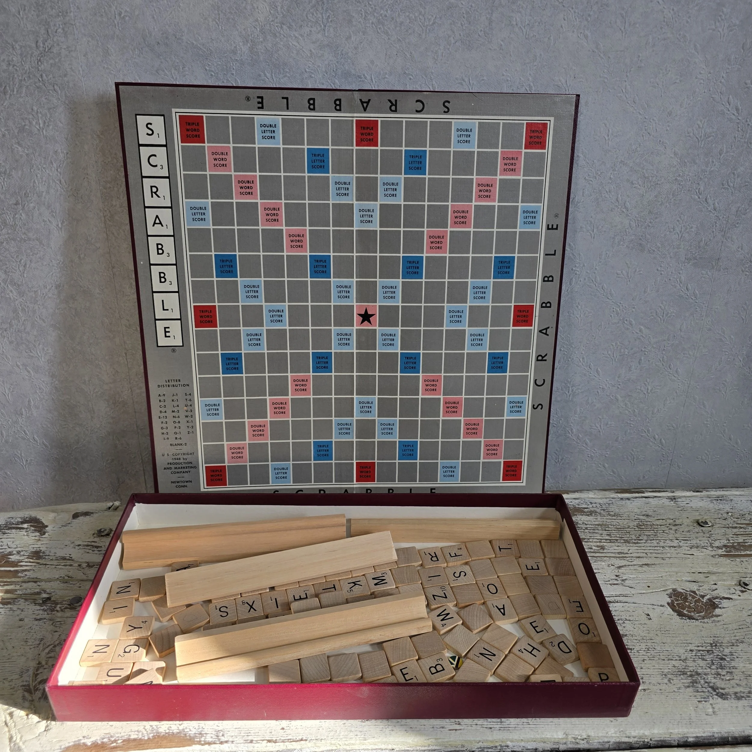 1940's scrabble game, contains all pieces.  $31