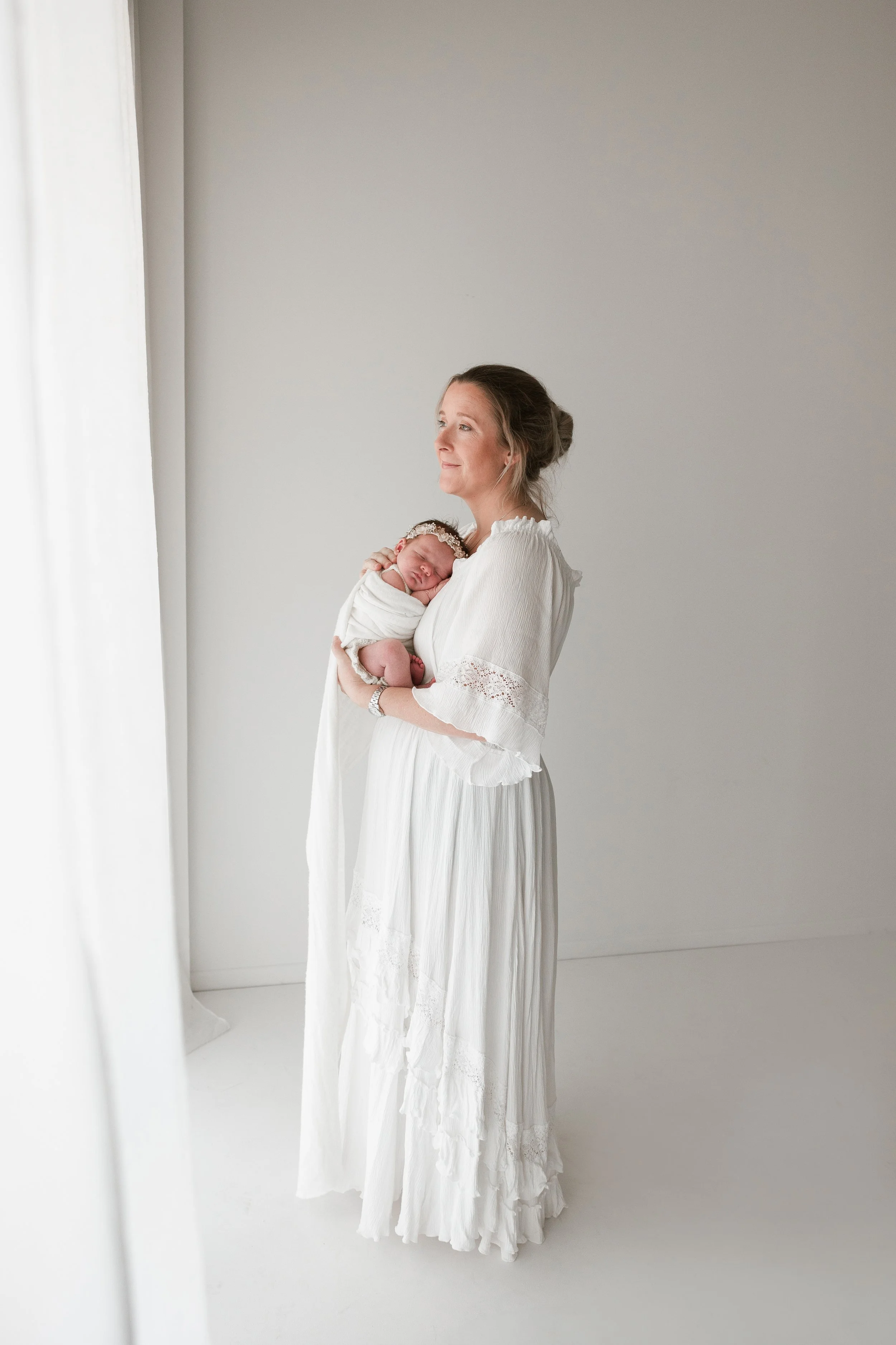 mother and baby in a studio
