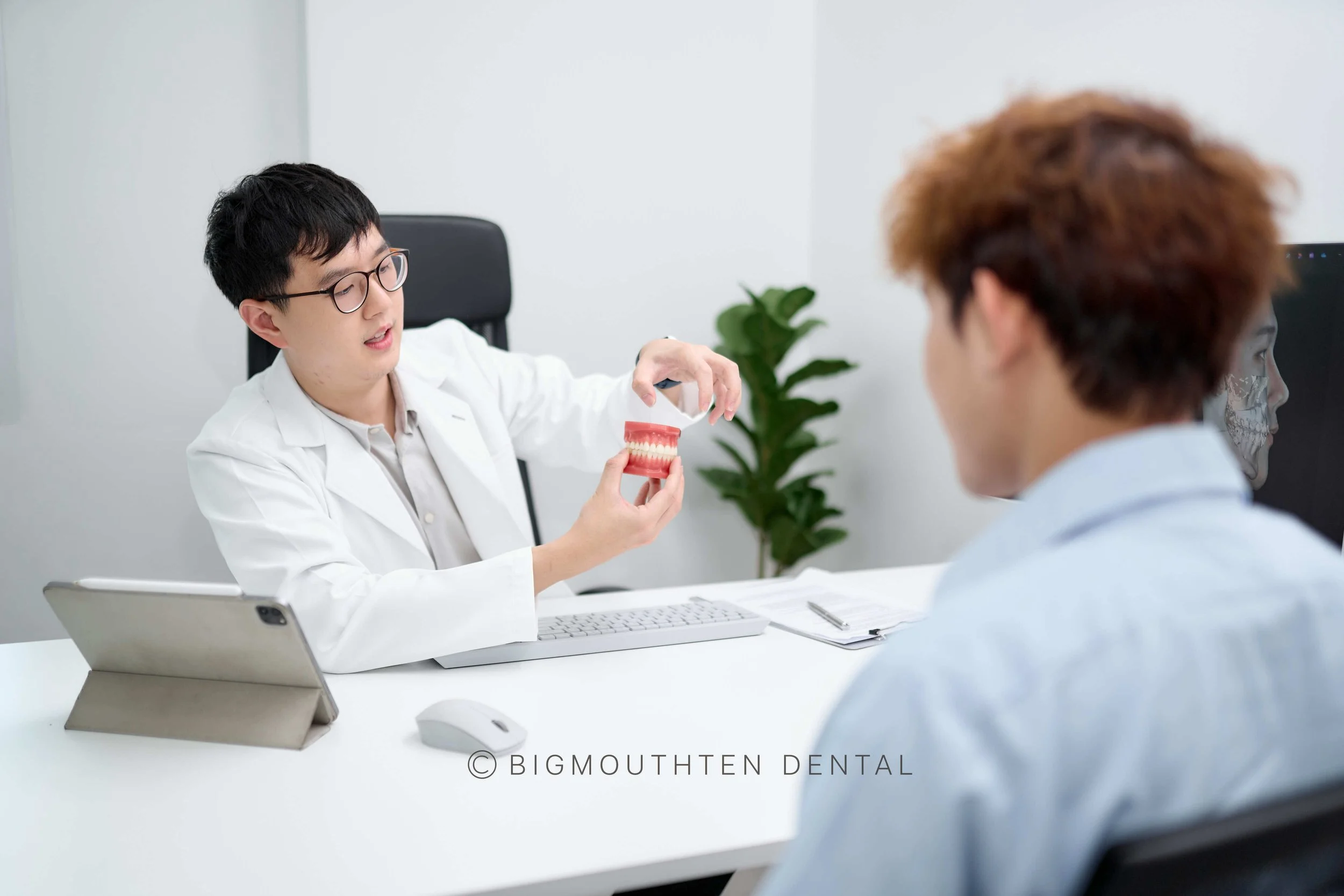 Dental specialists providing comprehensive oral care at Bigmouthten Chiang Mai