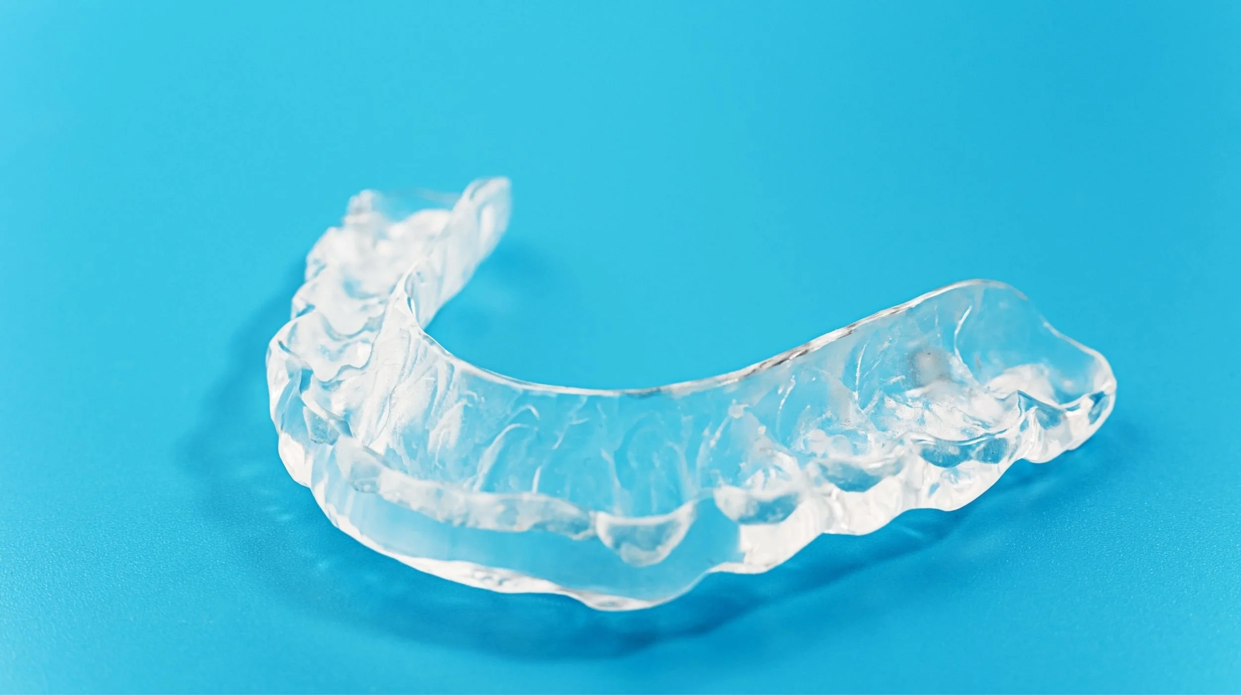 A custom-fit dental night guard to protect teeth from grinding and support TMJ health.