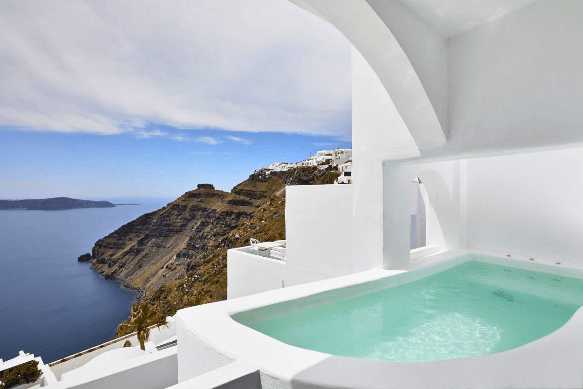 Dana Villas Cave Pool Suite in Firostefani with a private plunge pool and Santorini caldera views