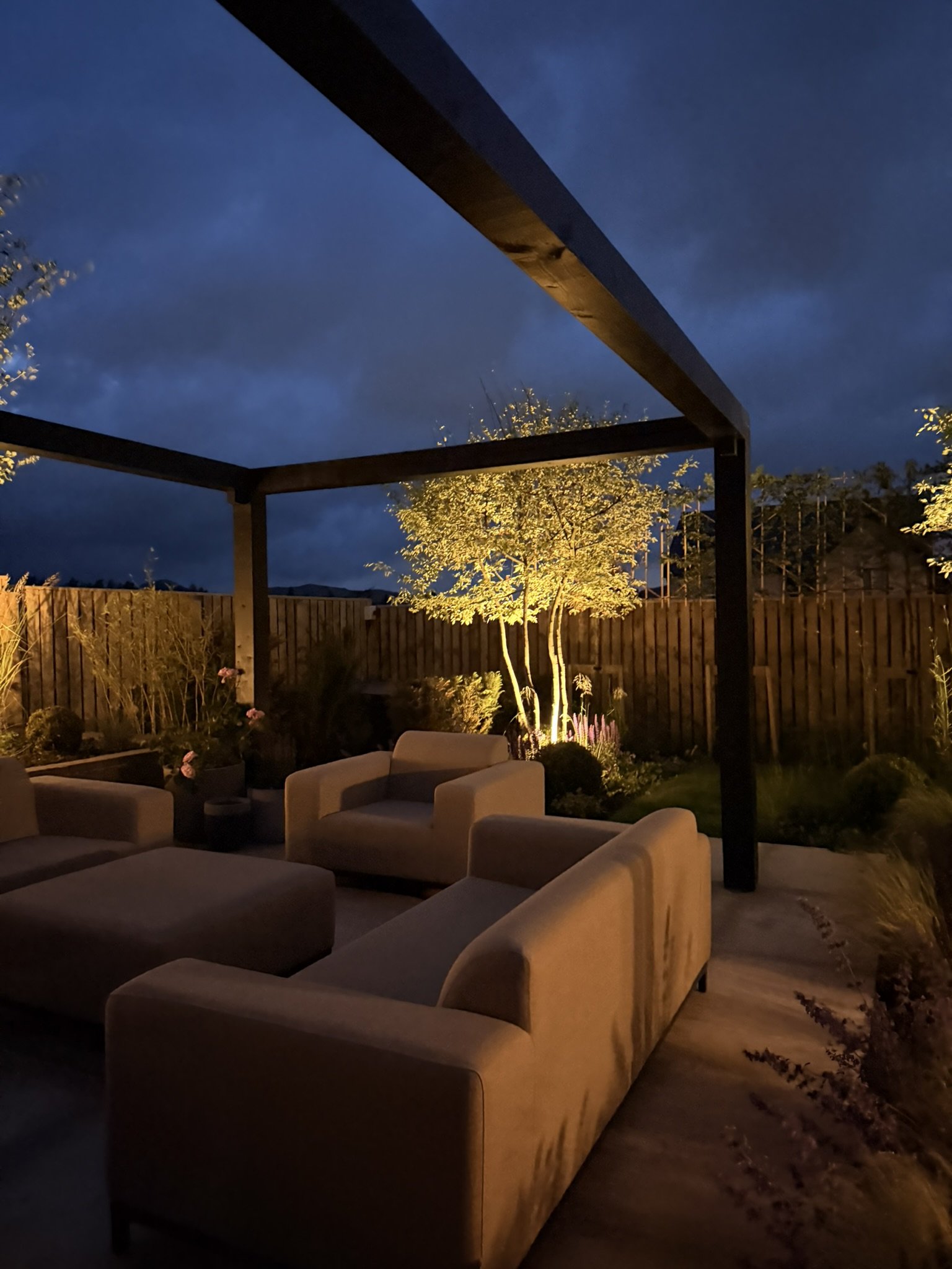 evening shot showing illuminated garden