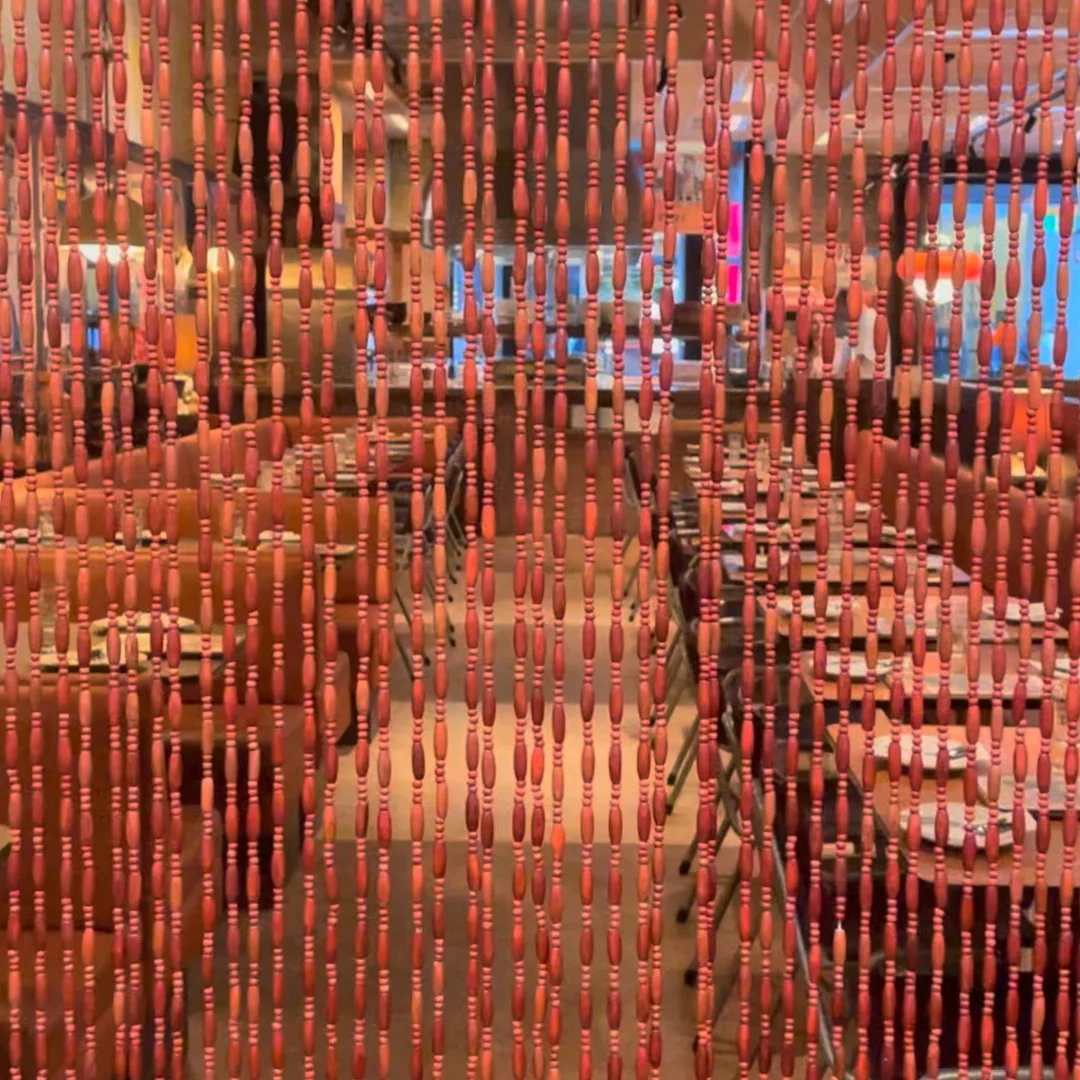 View of Jimmy's Falafel restaurant through the curtains for a behind the scene shoot