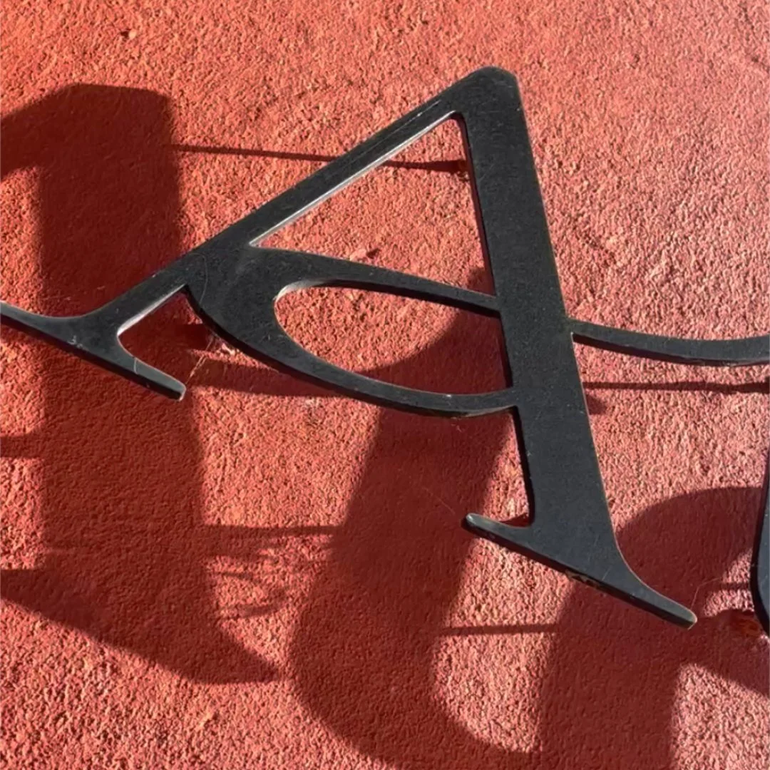 Close-up of the signage of the restaurant Ates in the Blue mountains