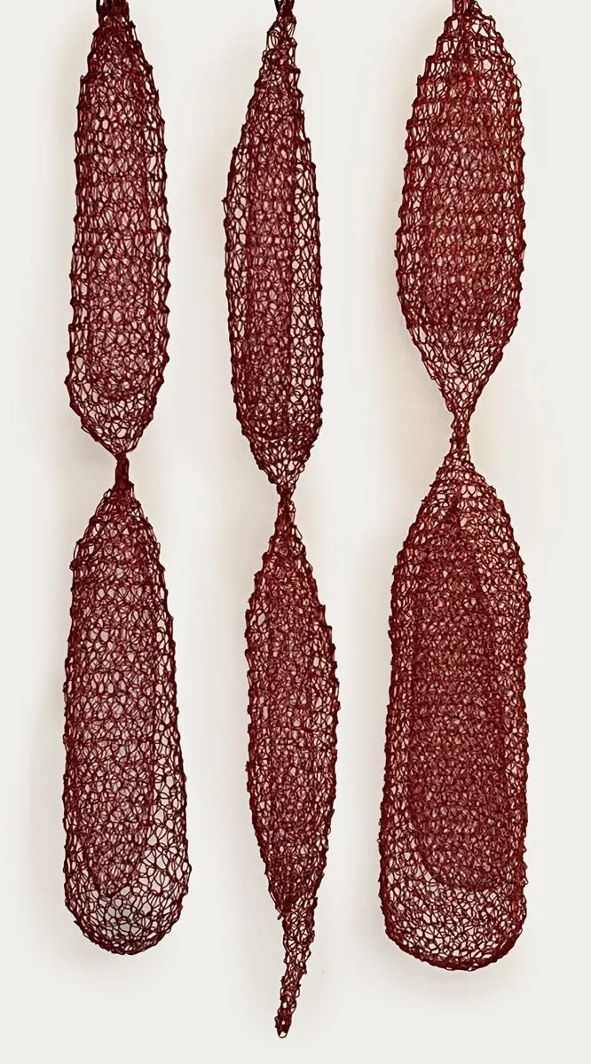 RED SEED PODS