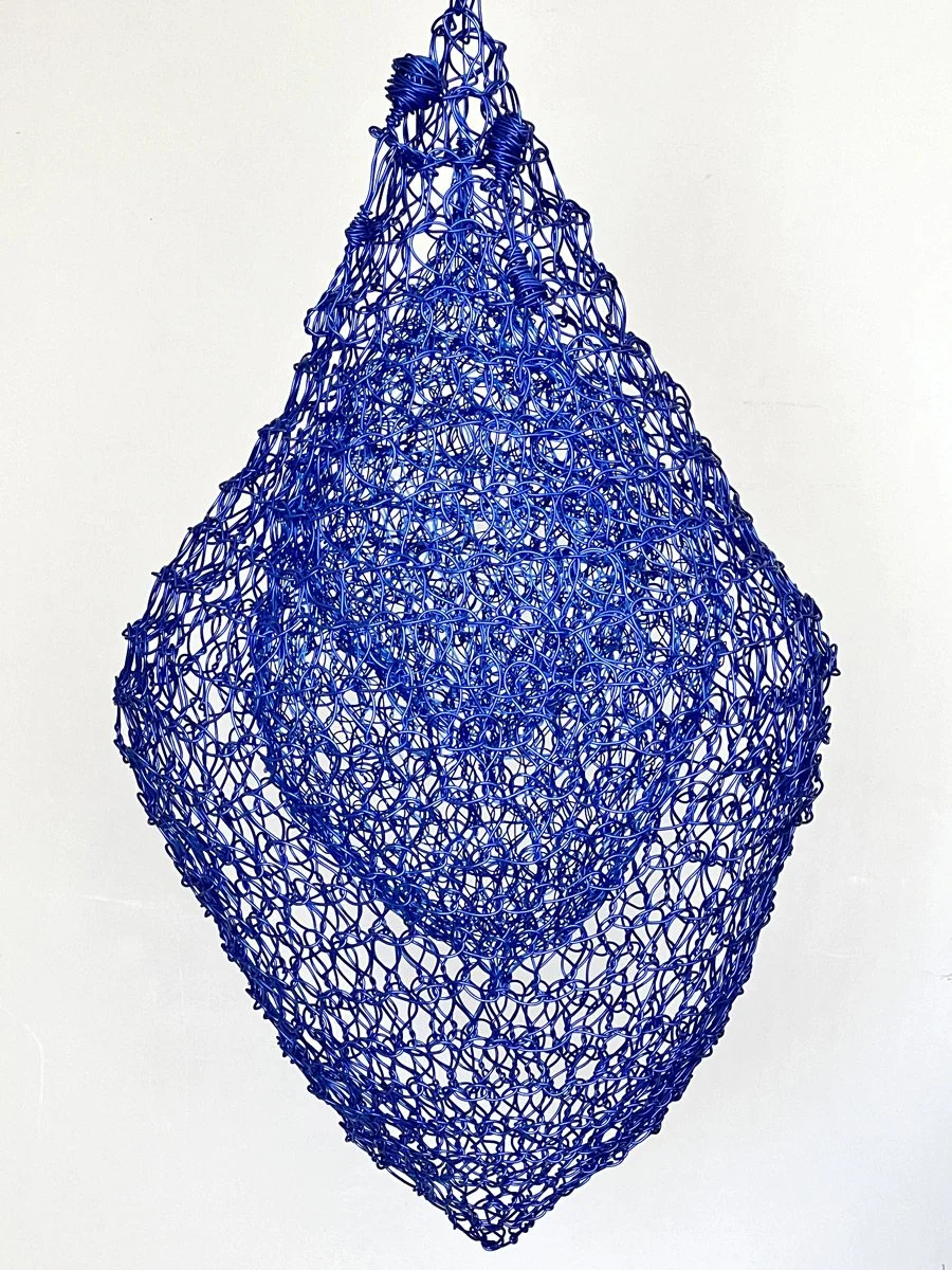 HOLD ON

This sculpture as part of the Tear Series has two
figures hanging on. As I made the sculpture the 
music worm of “hang on, help is on the way” 
constantly repeated in my brain. 