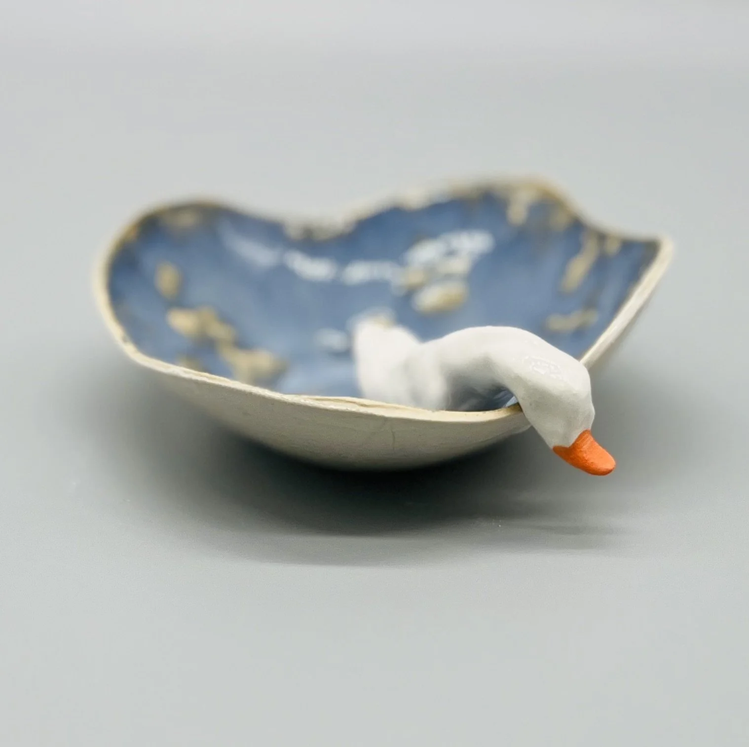 Duck peeking over edge small (1).jpeg