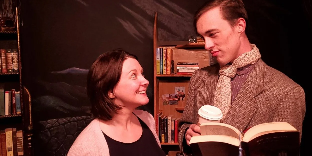 Woman smiling at a man holding a book and a coffee cup in a cozy room with bookshelves.