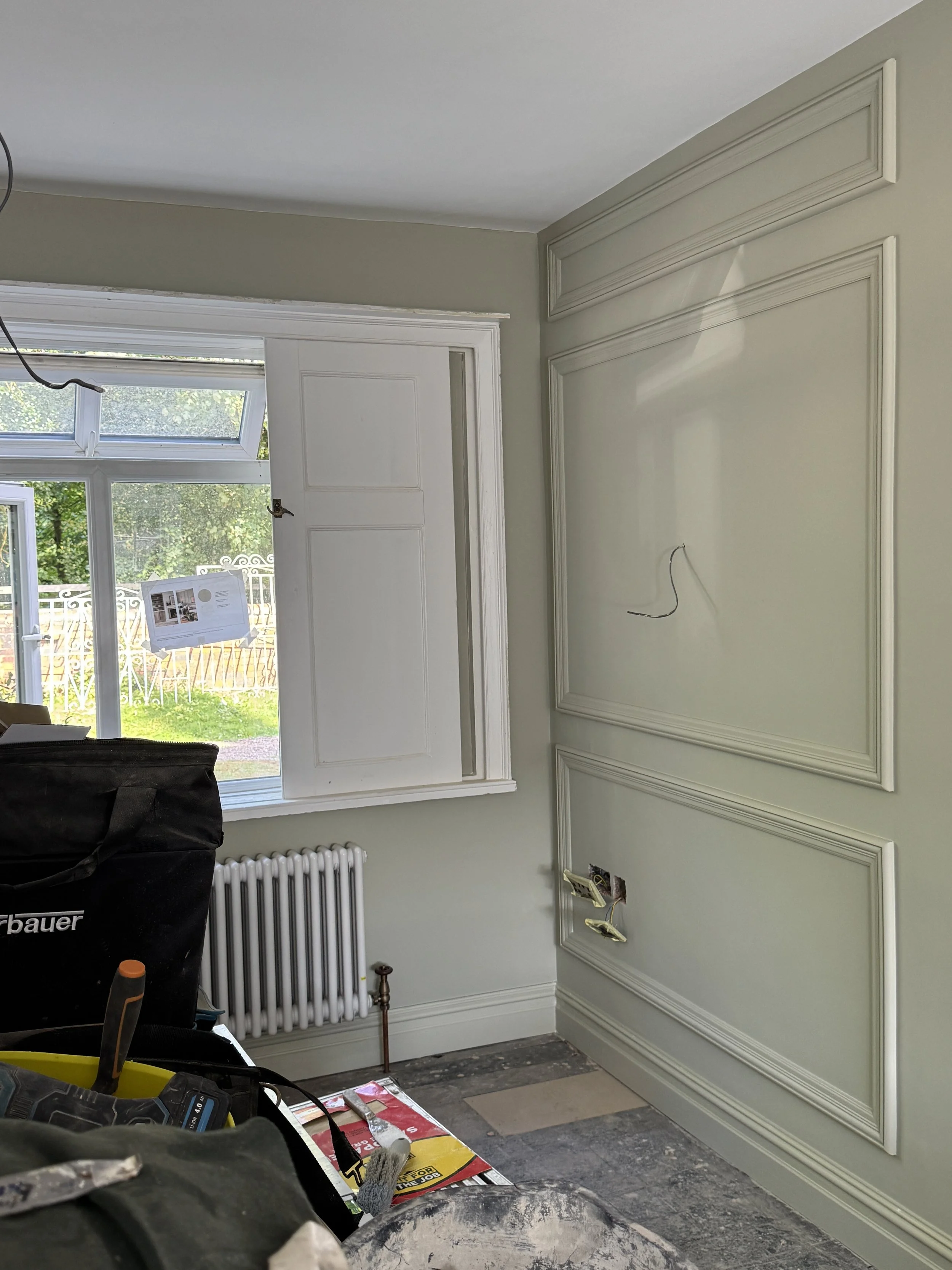 Decorative wall panelling designed to introduce depth, proportion and timeless architectural character within the home.