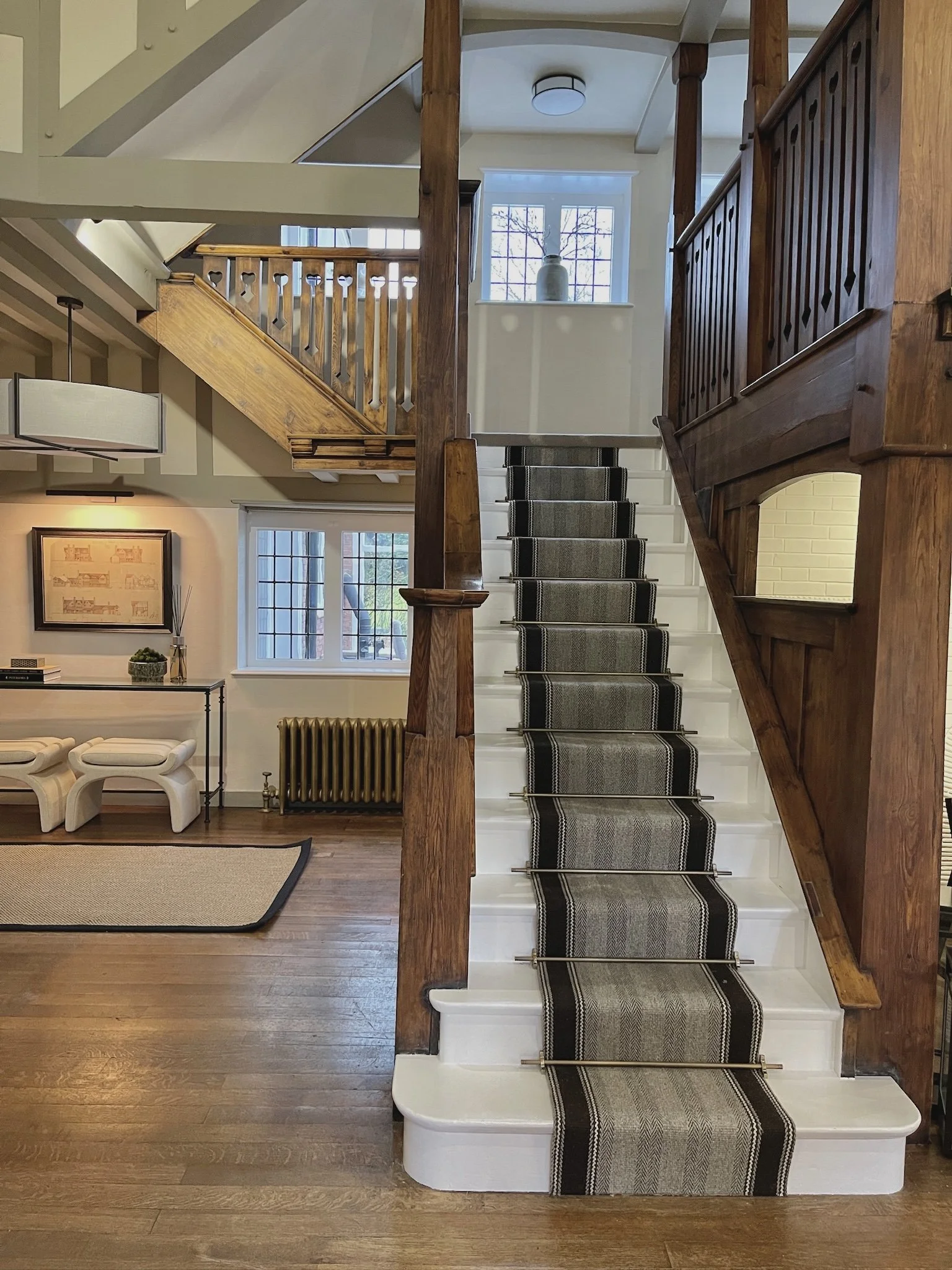 Original oak staircase with bespoke stair runner in a Grade II listed property thoughtfully renovated by Istigh Interiors.