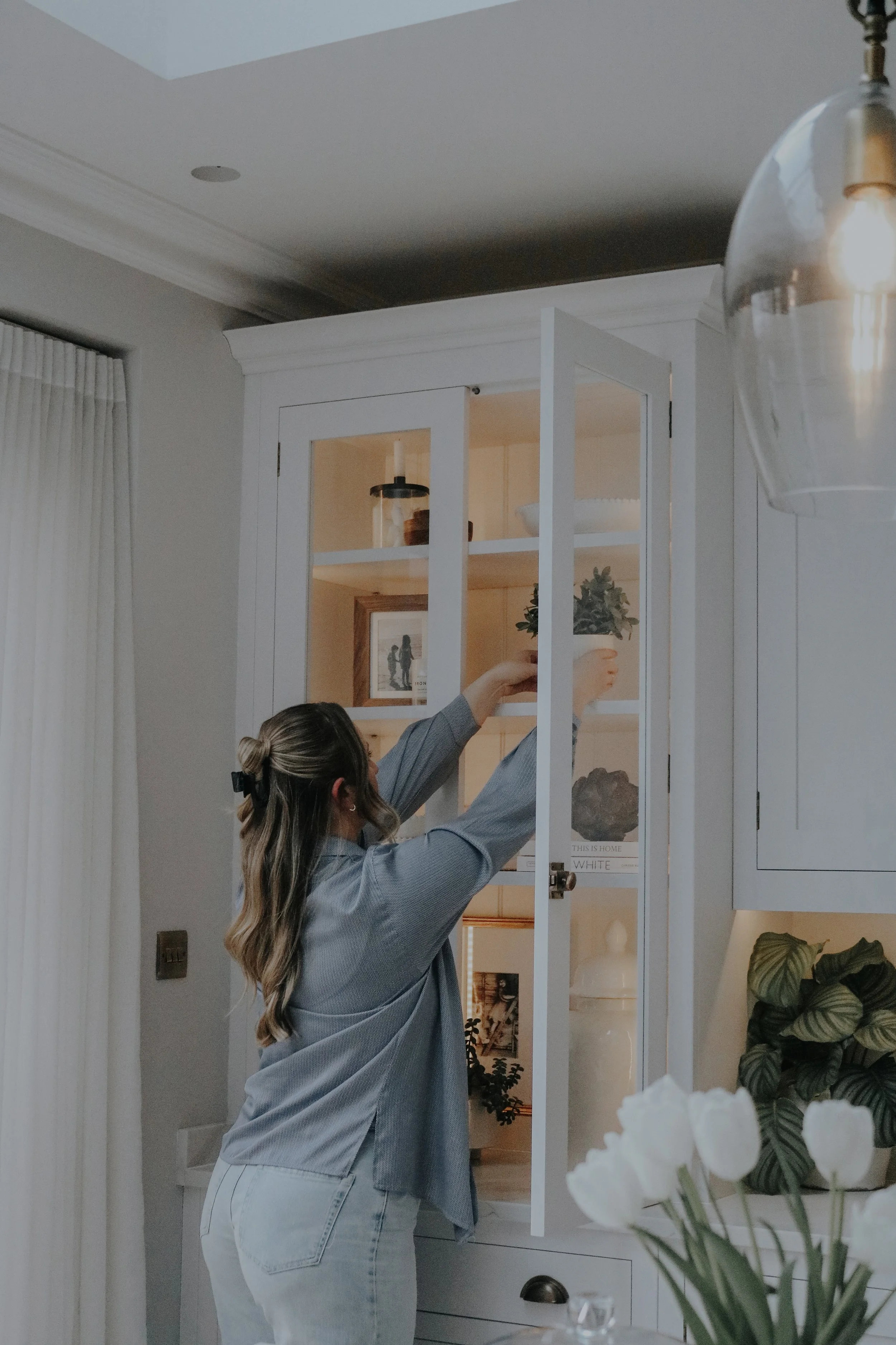 Interior designer Annika Webb styling bespoke joinery in a residential project by Istigh Interiors in Shropshire.