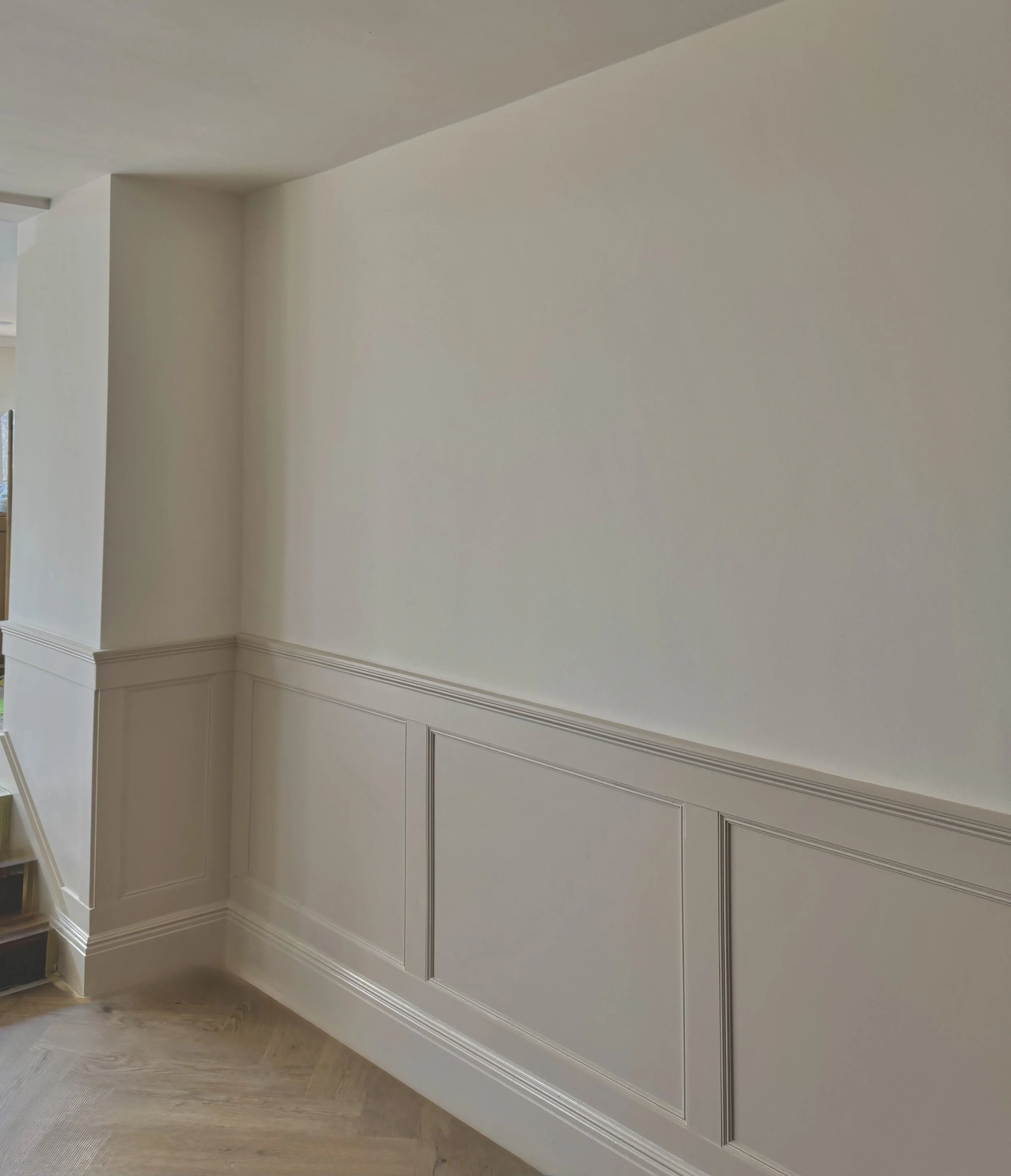 Classic wall panelling introduces character and architectural detail from the moment you enter Project Orton, creating a timeless first impression.
