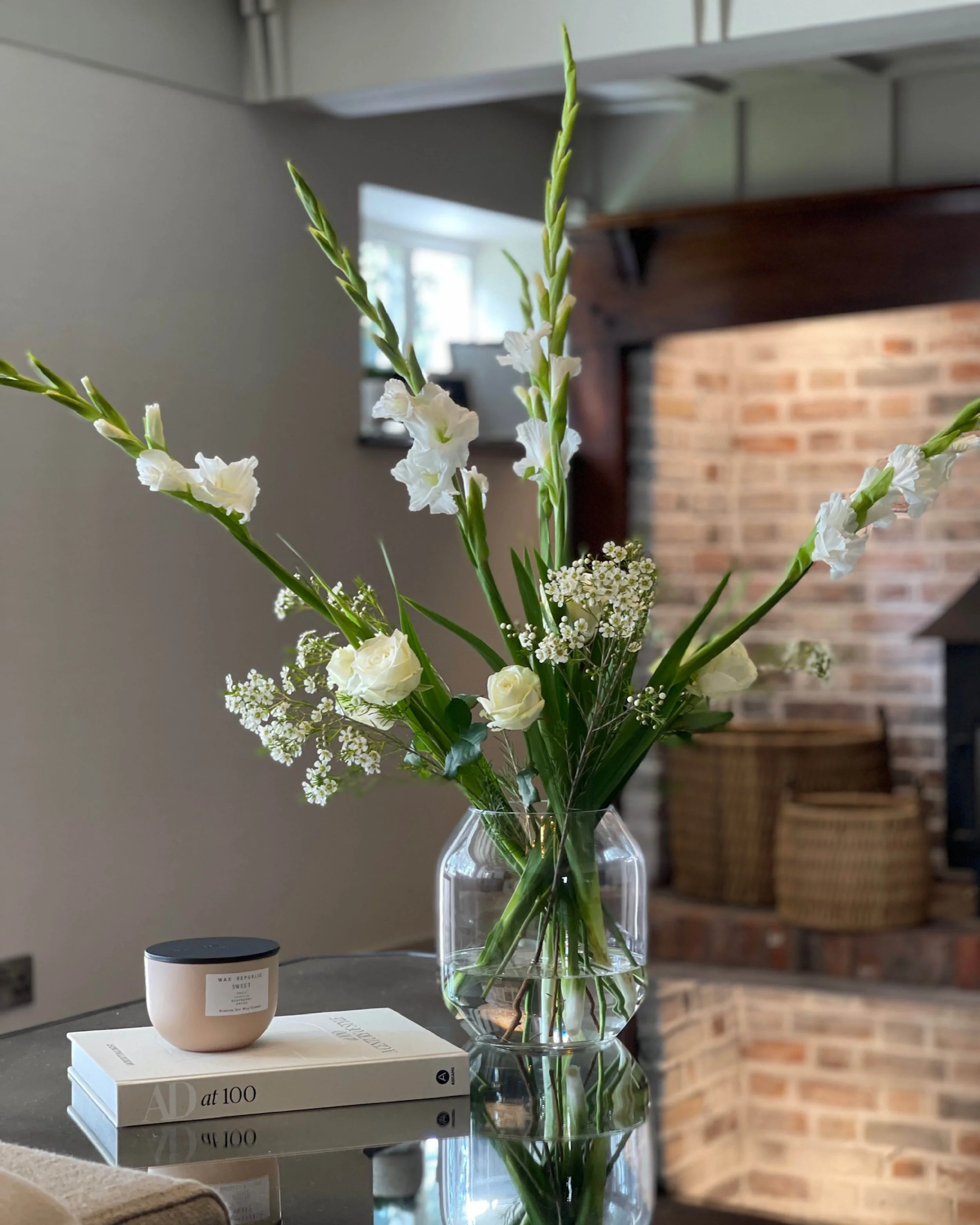 Fresh floral arrangement styled within a luxury living room designed by Istigh Interiors for a Grade II listed family home in the West Midlands.
