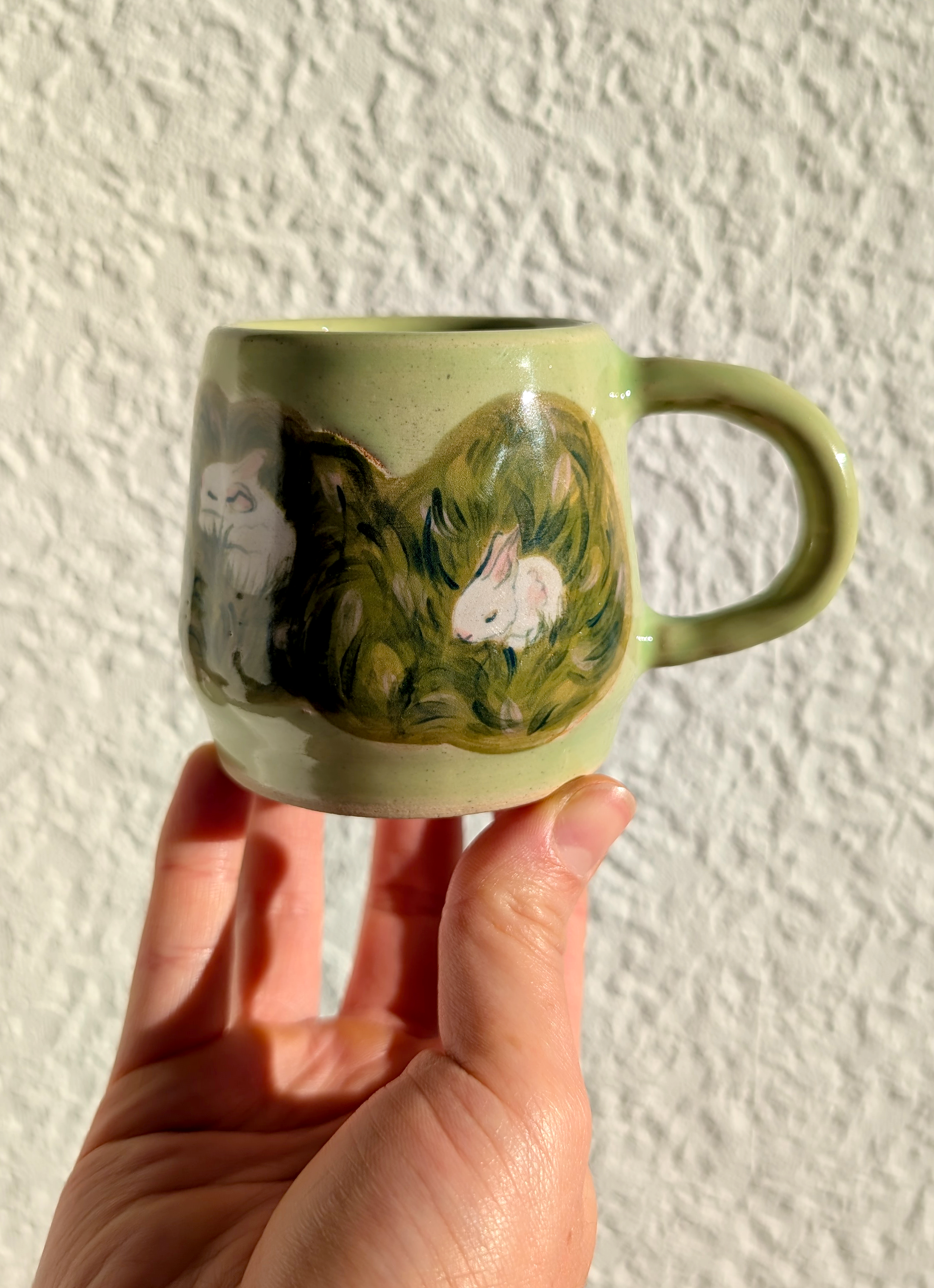 rabbits in the grass mug back edited.png